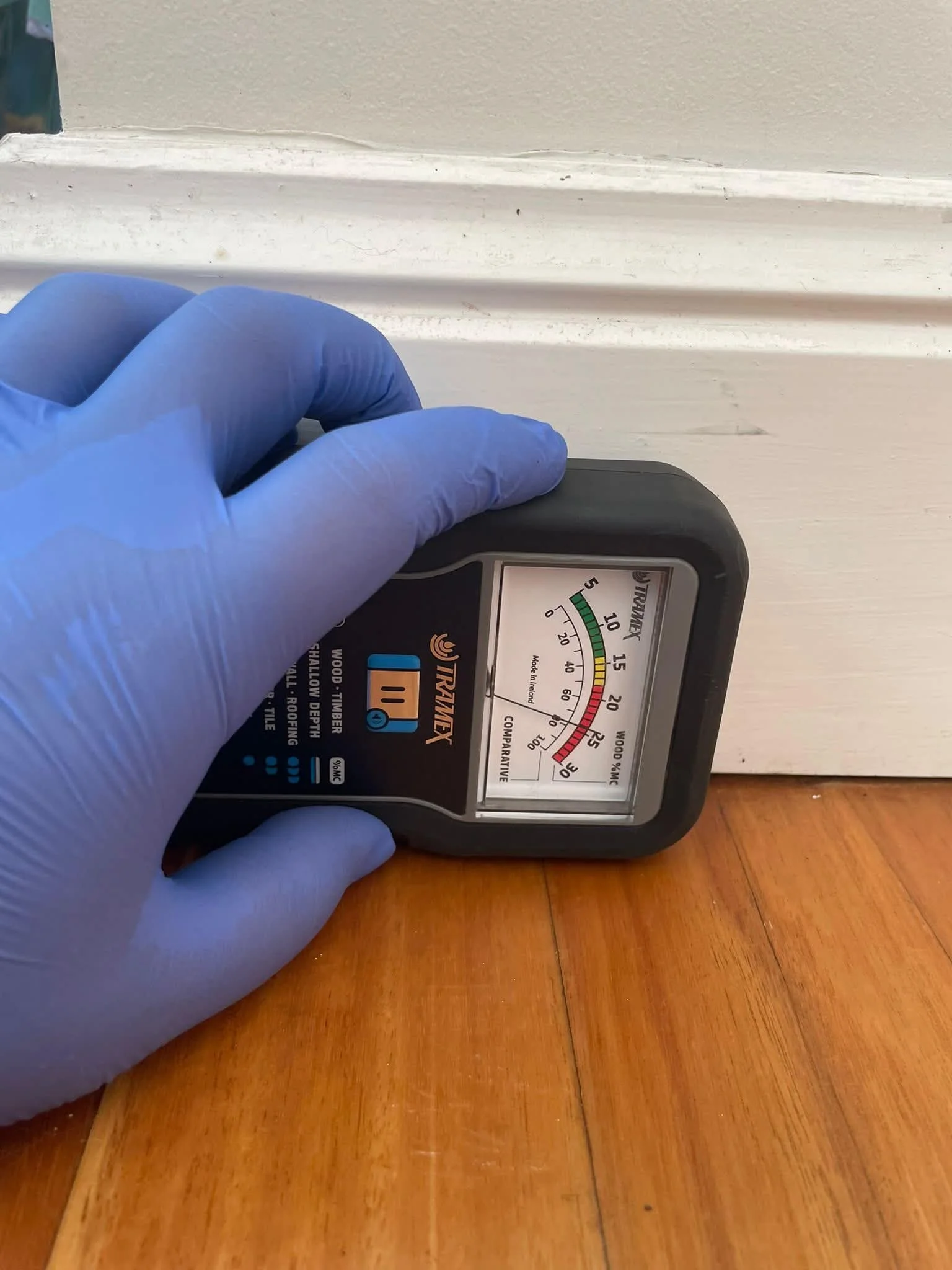 Moisture meter being used during a professional termite inspection in Sydney
