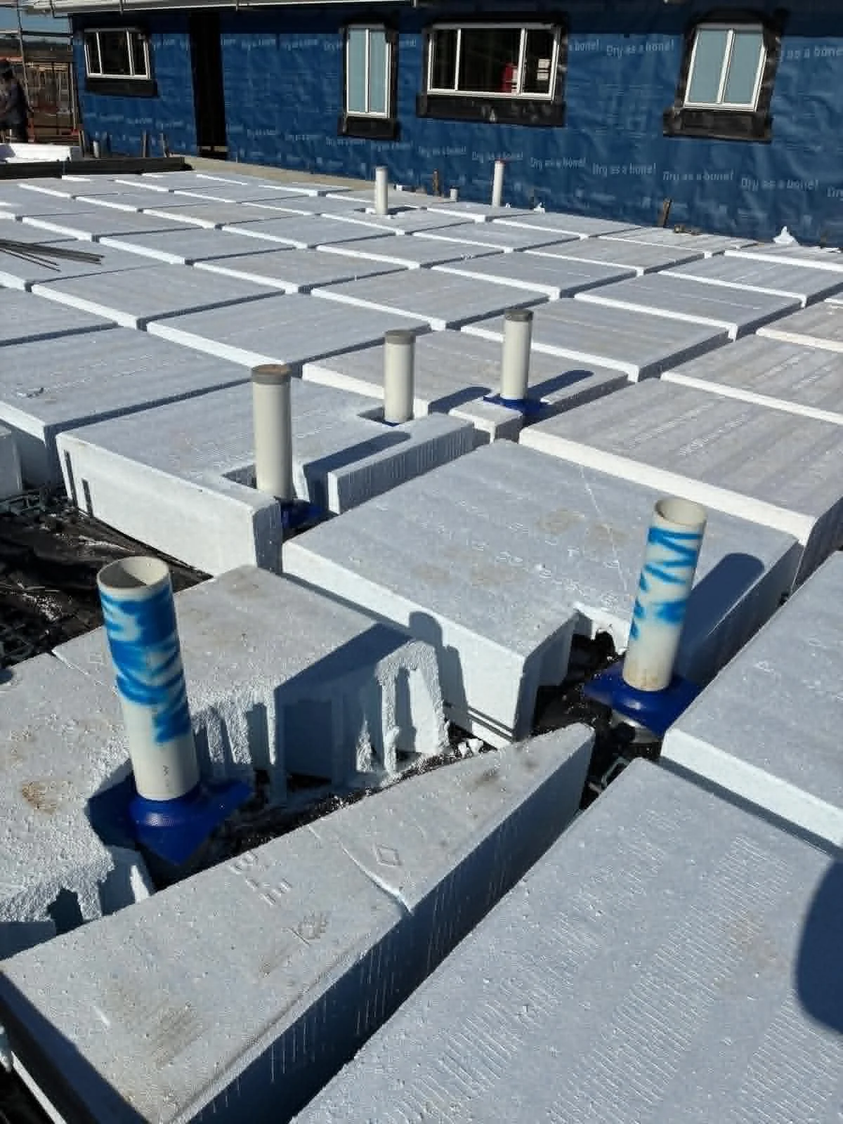 Pre-construction termite barrier system installed around pipe penetrations