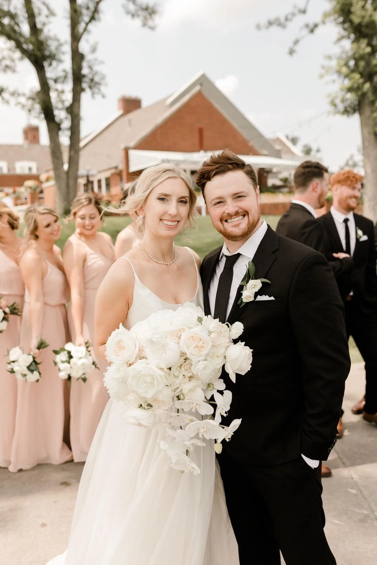 White bridal bouquet with orchids