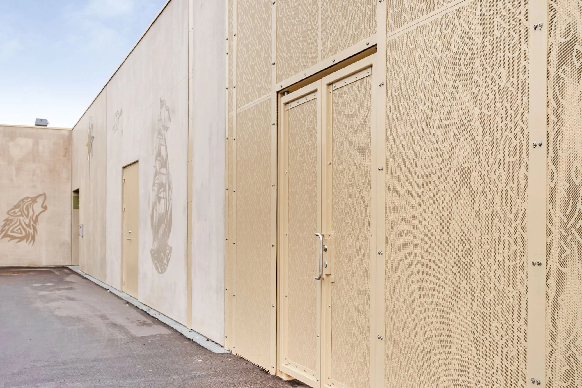 Exterior entrance at Sønder Omme Prison with integrated artistic elements