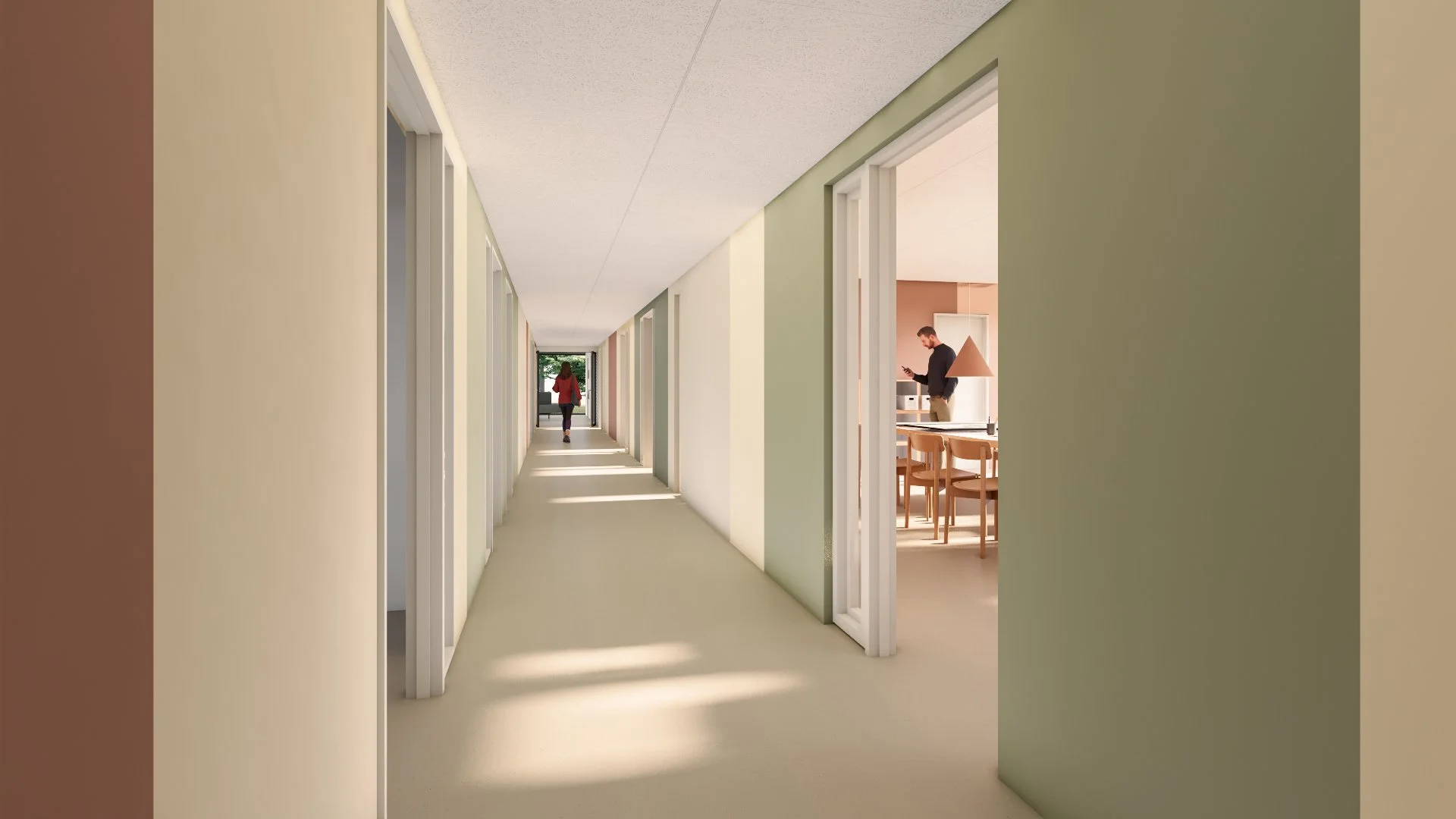 Gang på første sal med terapirum og farveguide.