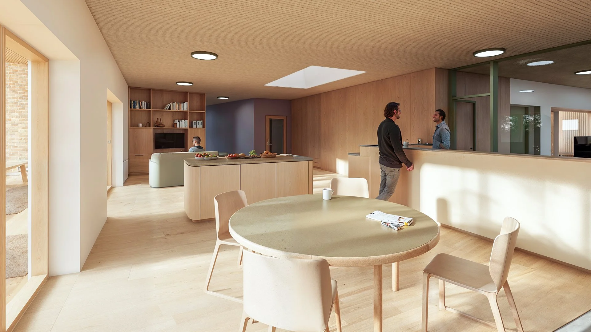 Interior common space in the Little H building with daylight and seating