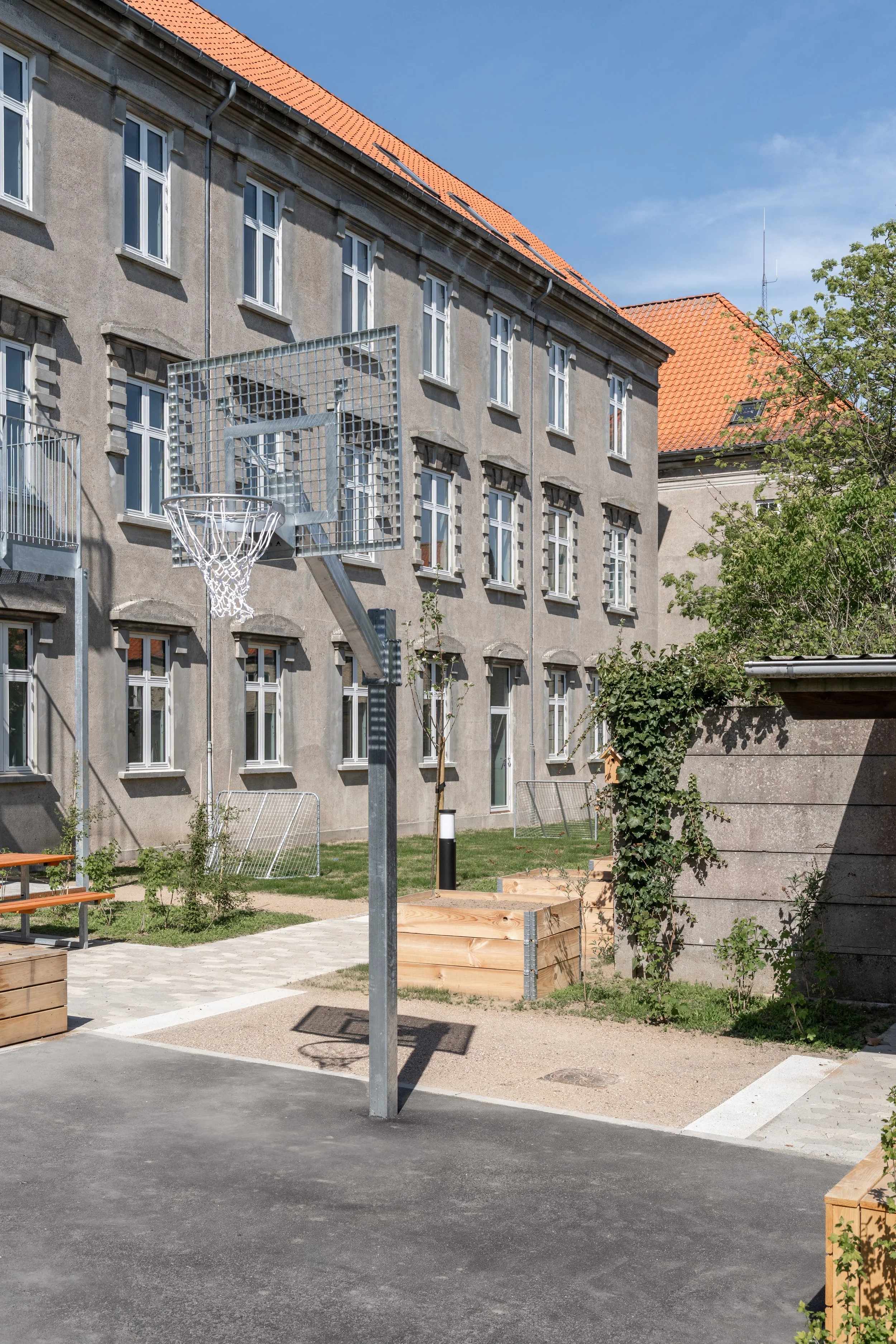 Basketball court in the outdoor activity area at Maribo Halfway House