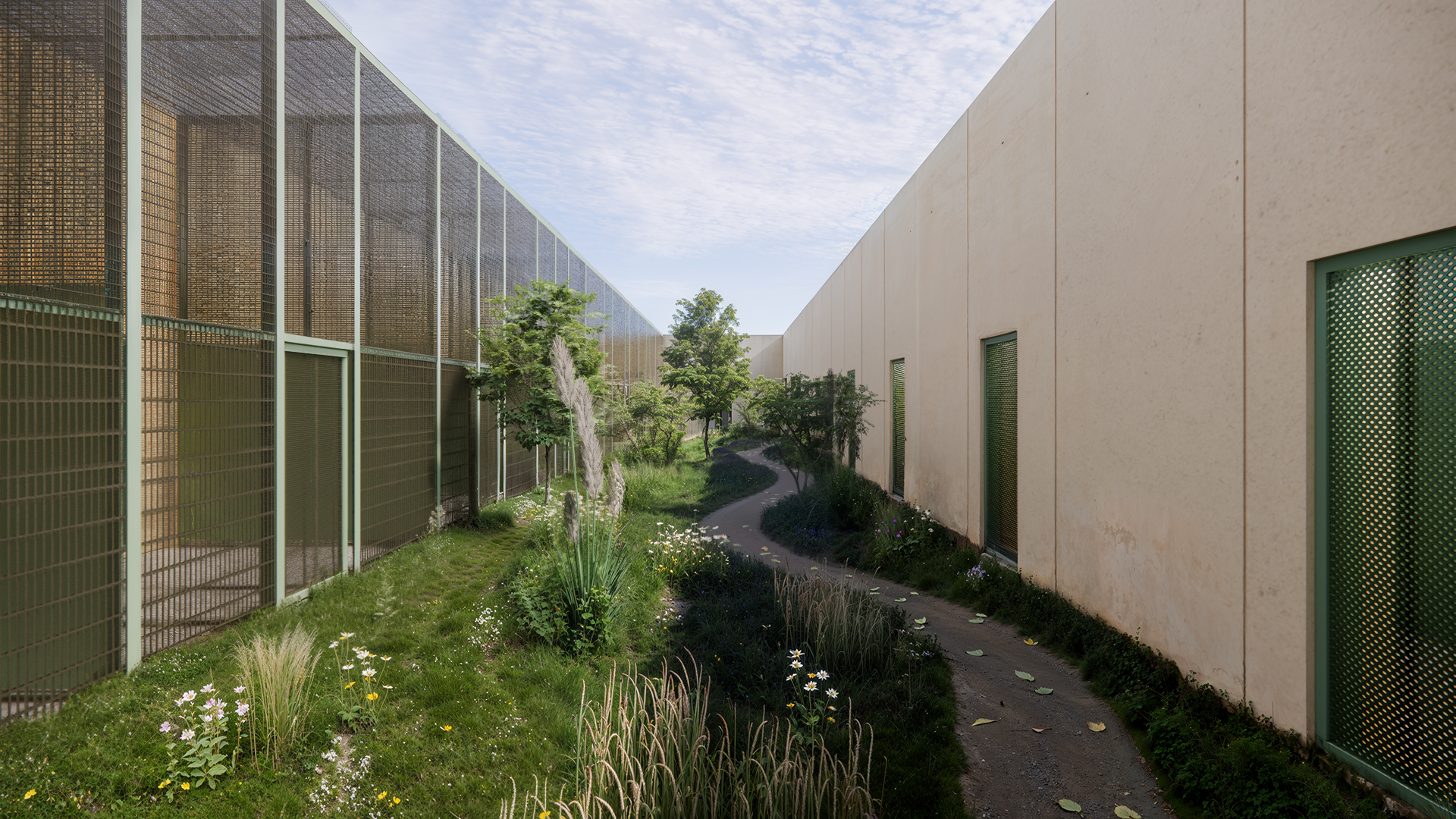 Courtyard at Sønder Omme Prison providing outdoor space between the buildings