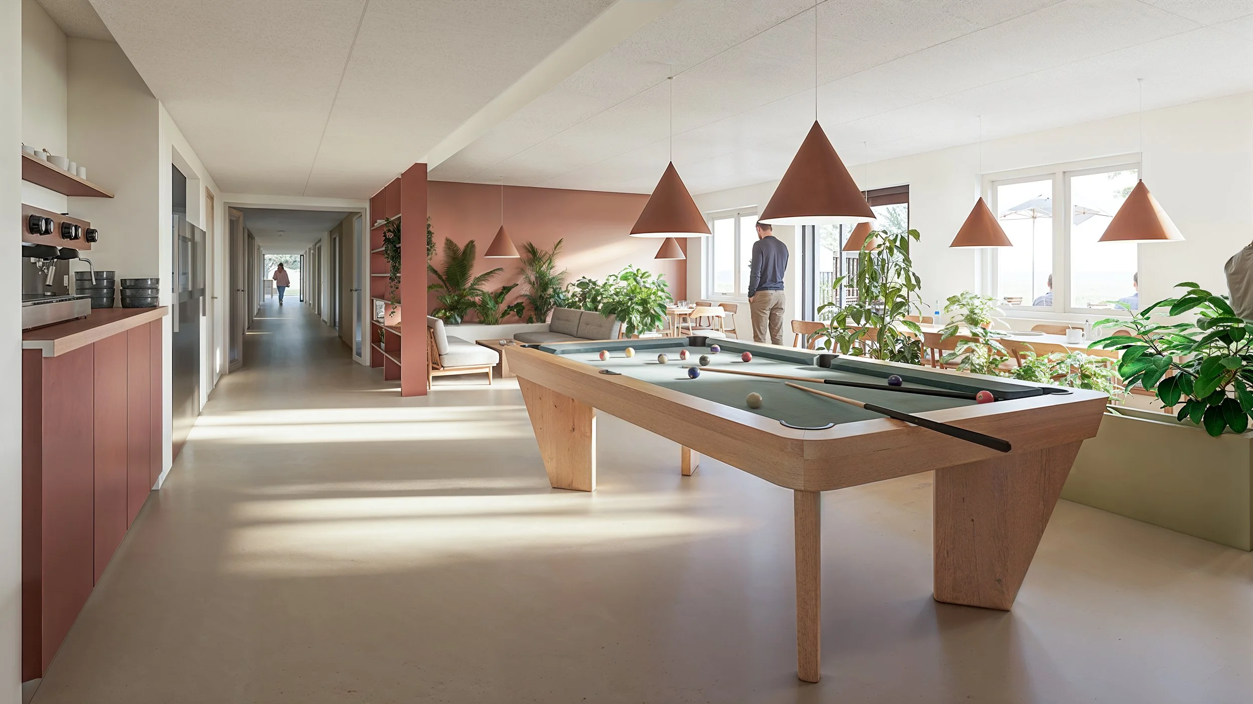 Billardbord i Café Fokus der skaber aktivitet og fleksibel brug af rummet.