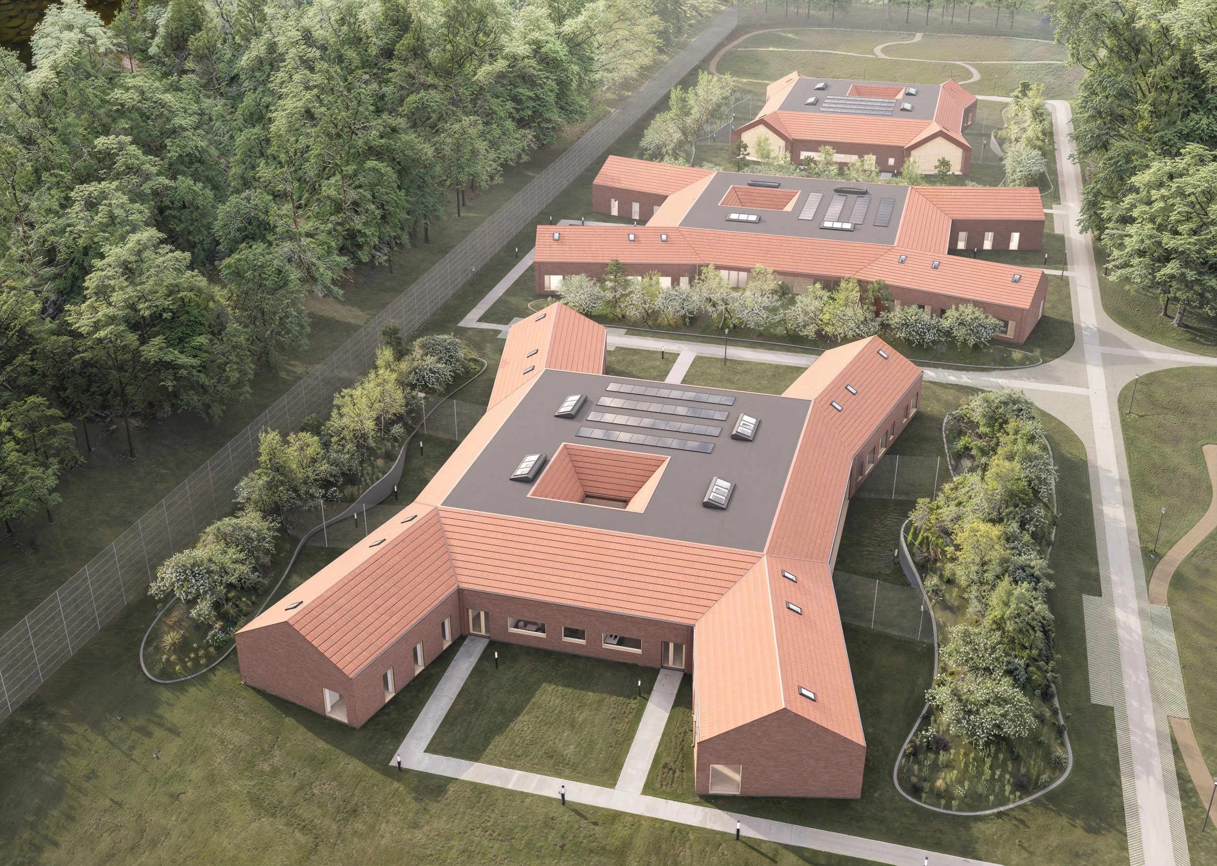 Aerial view of Kofoedsminde showing secure residential architecture integrated into the surrounding landscape