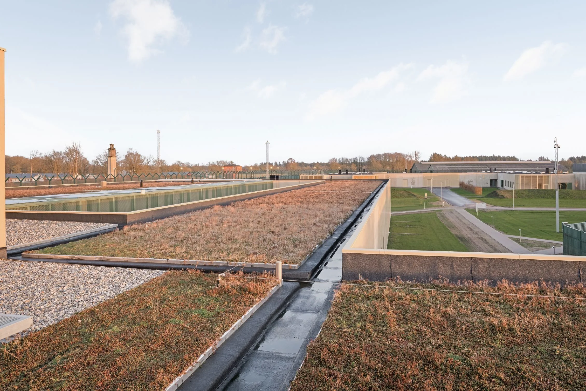 Exterior view of rooftops across multiple buildings at Sønder Omme Prison
