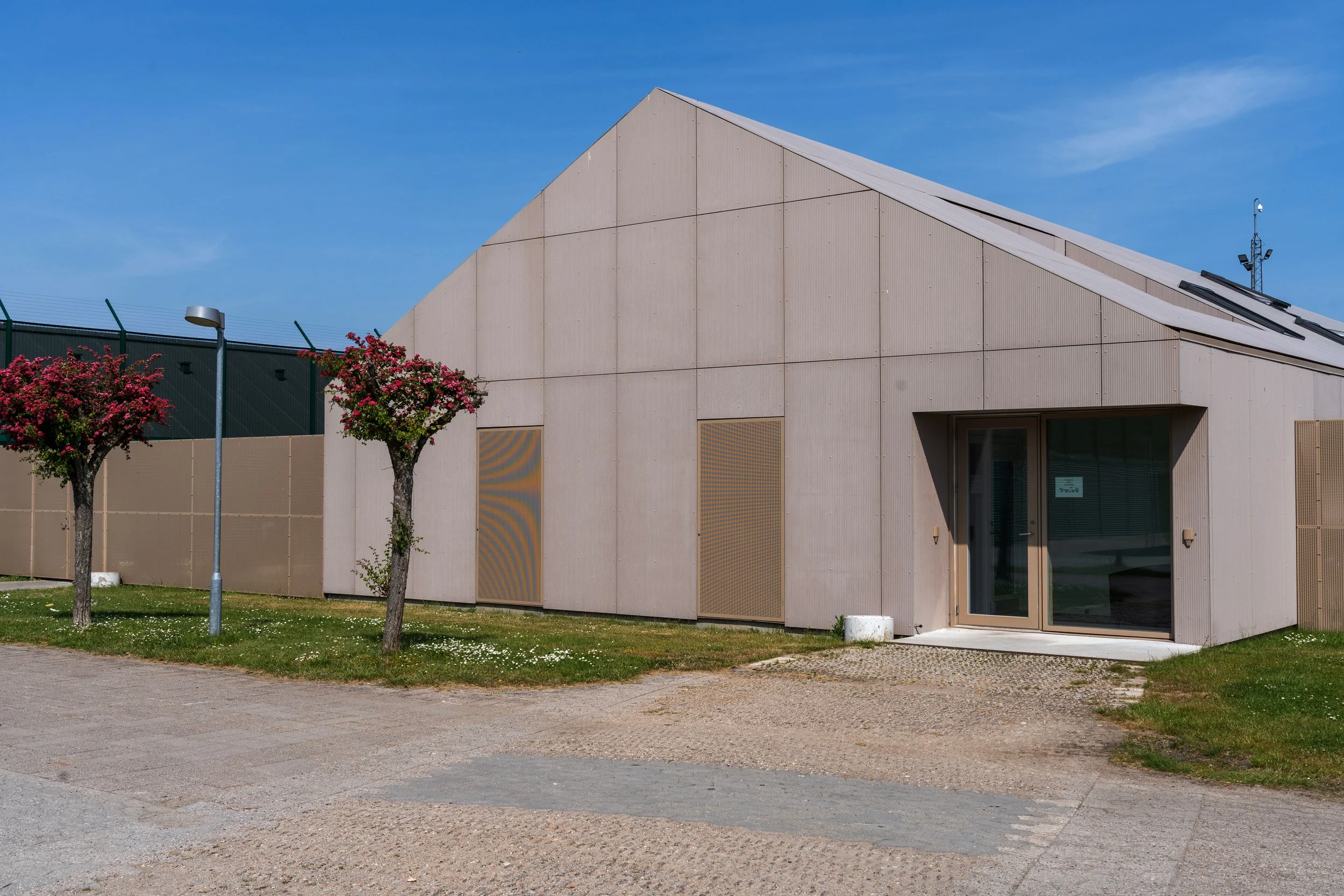 Angled view of the visiting building’s façade