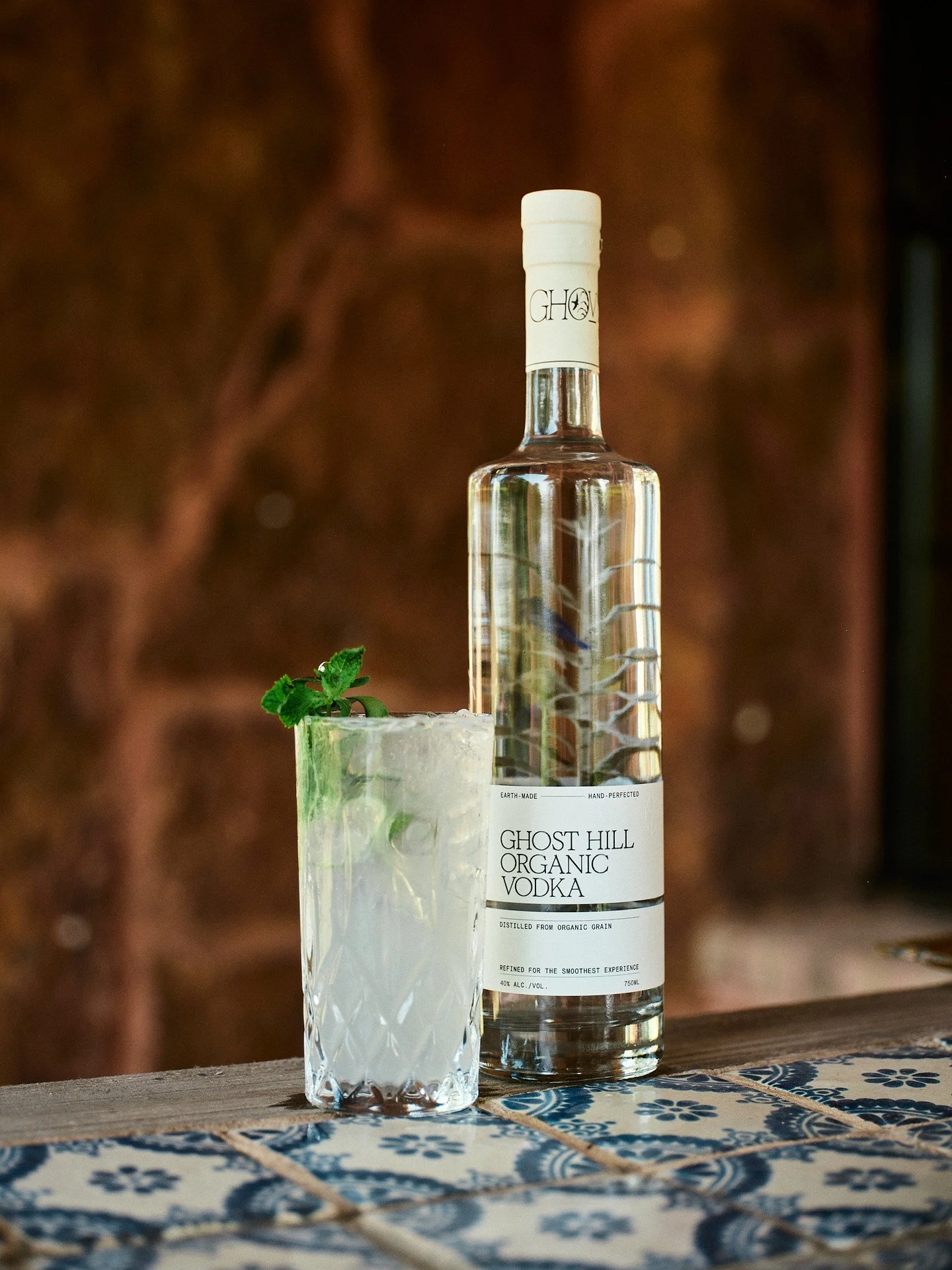 The Ghost Hill Mojito
A crisp, organic twist on a timeless classic

Ingredients:
2 oz Ghost Hill Organic Vodka
1 oz fresh lime juice
&frac34; oz simple syrup (or agave nectar for extra smoothness)
8-10 fresh mint leaves
Club soda
Crushed ice
Mint spr