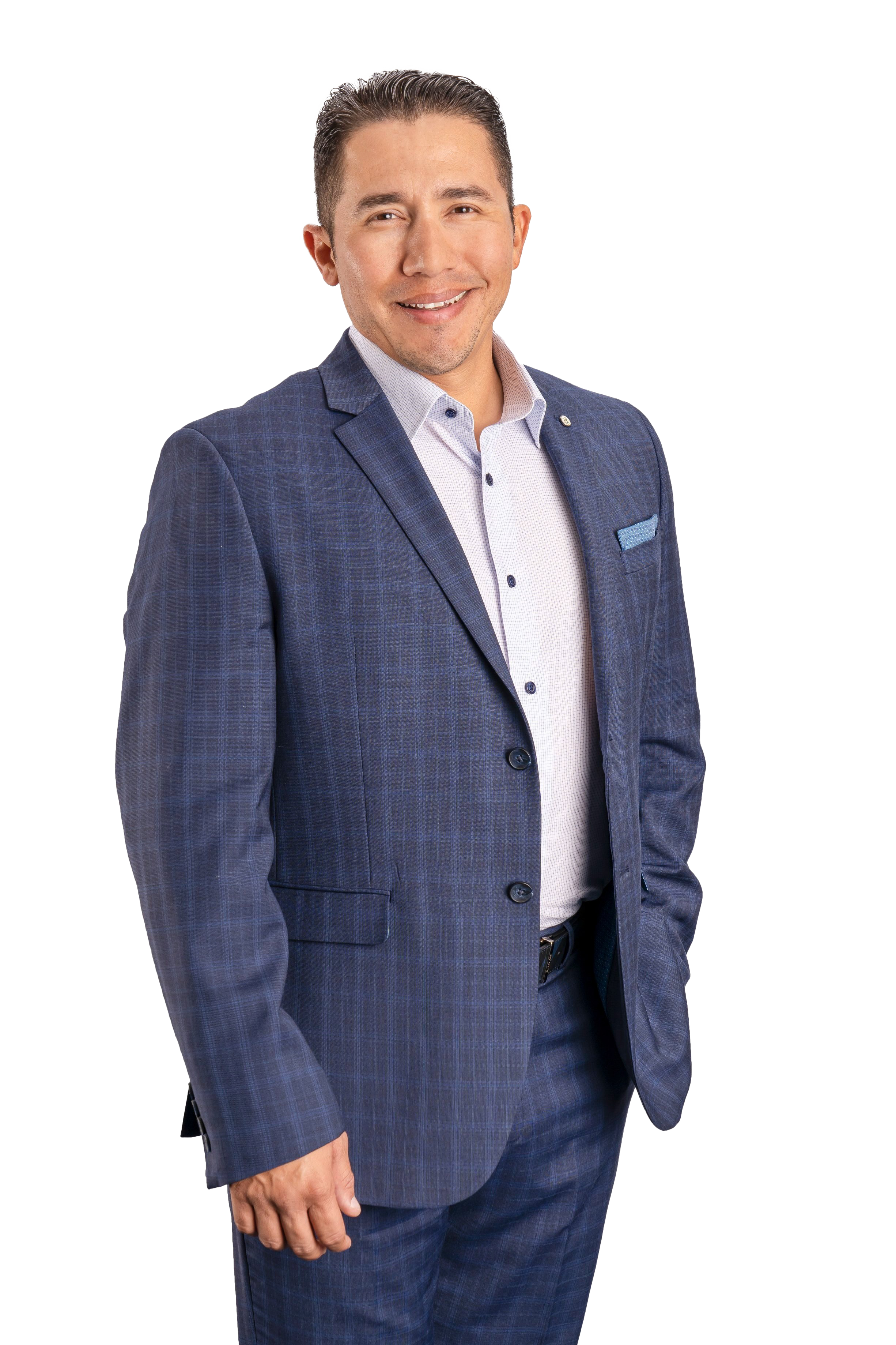 A man in a blue checked suit smiling, wearing a white shirt, against a clear background.