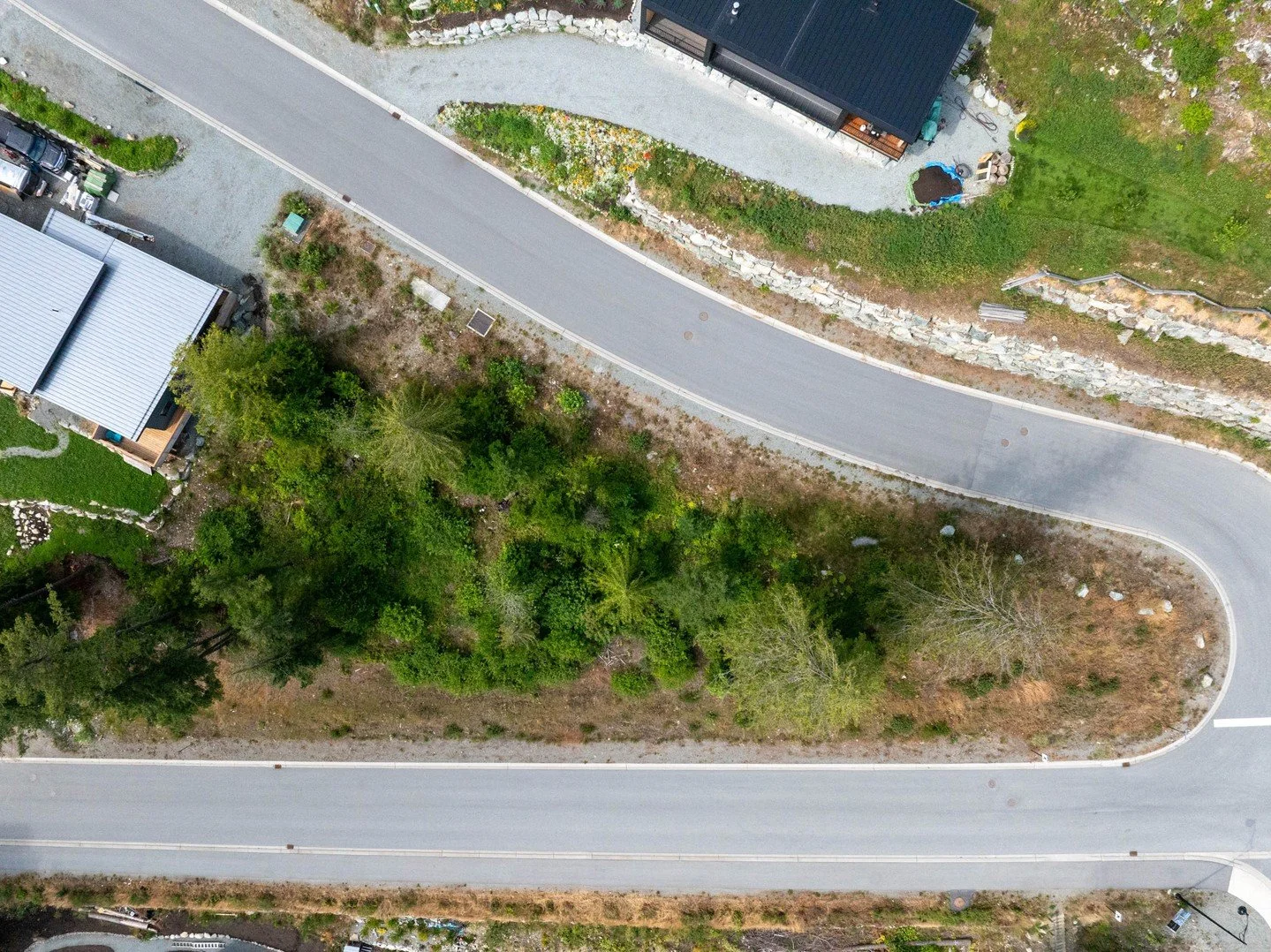 Frontage on two streets = WAY more design freedom.⁠
⁠
7661 Cerulean sits on a true corner lot with frontage on both the upper and lower roads, which completely changes how you can design the home.⁠
⁠
You&rsquo;re not locked into one approach here.⁠
⁠