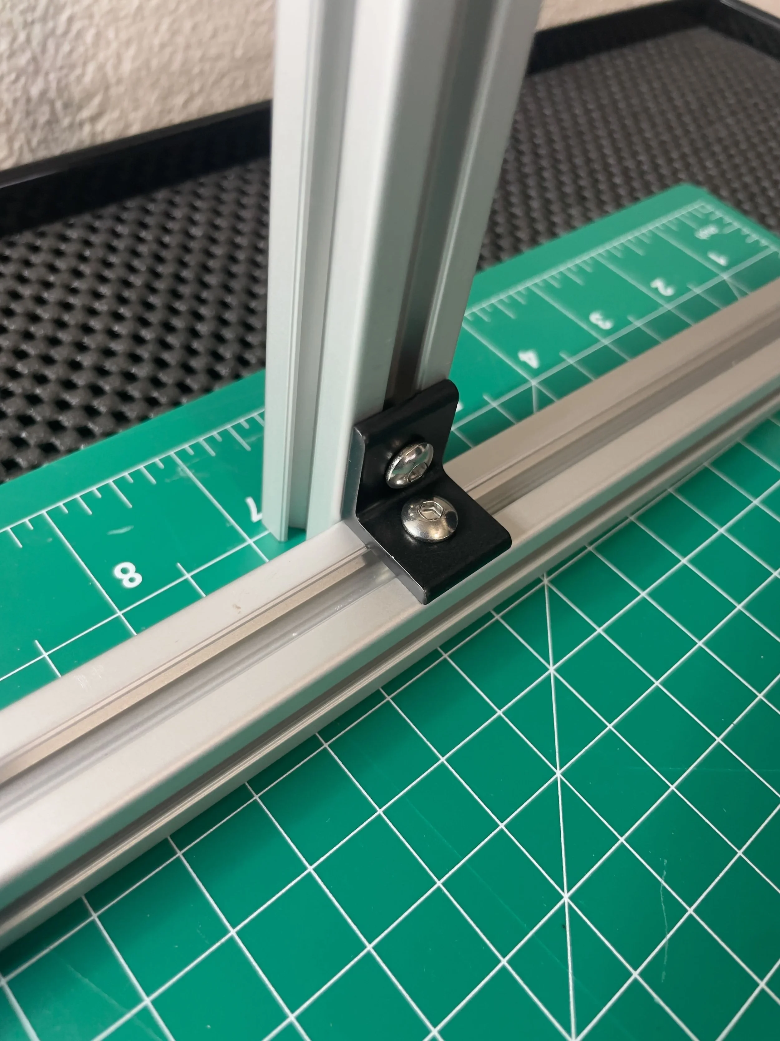 L-bracket on the upright column