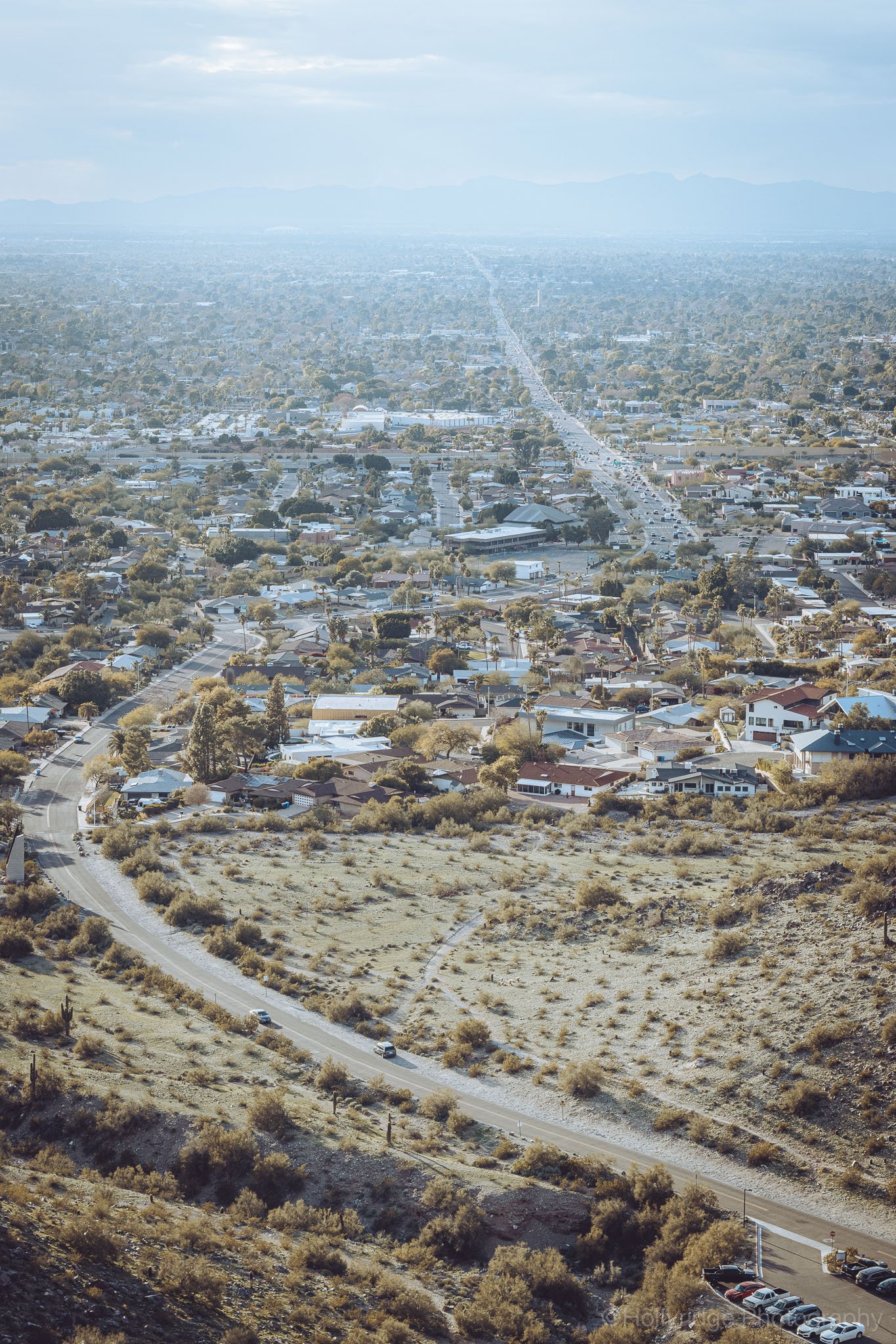 Phoenix city skyline viewed from roadside perspective in Arizona