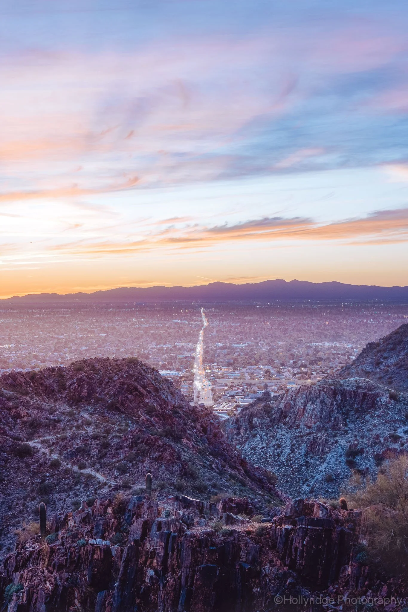 Phoenix skyline seen from Piestewa Peak overlooking the city at dusk