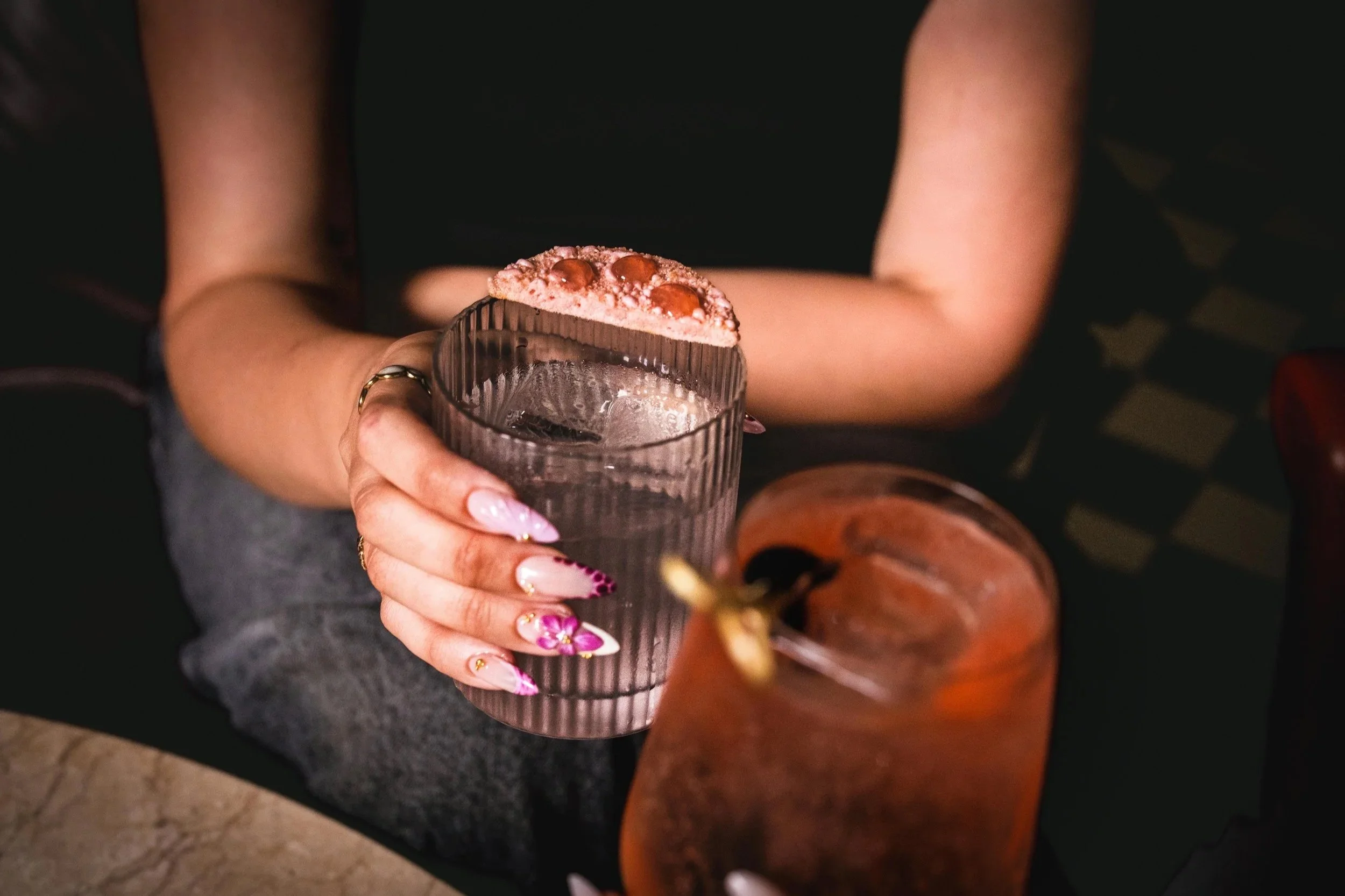 Cocktails being served at Side Street, a low-lit cocktail bar in Spinningfields