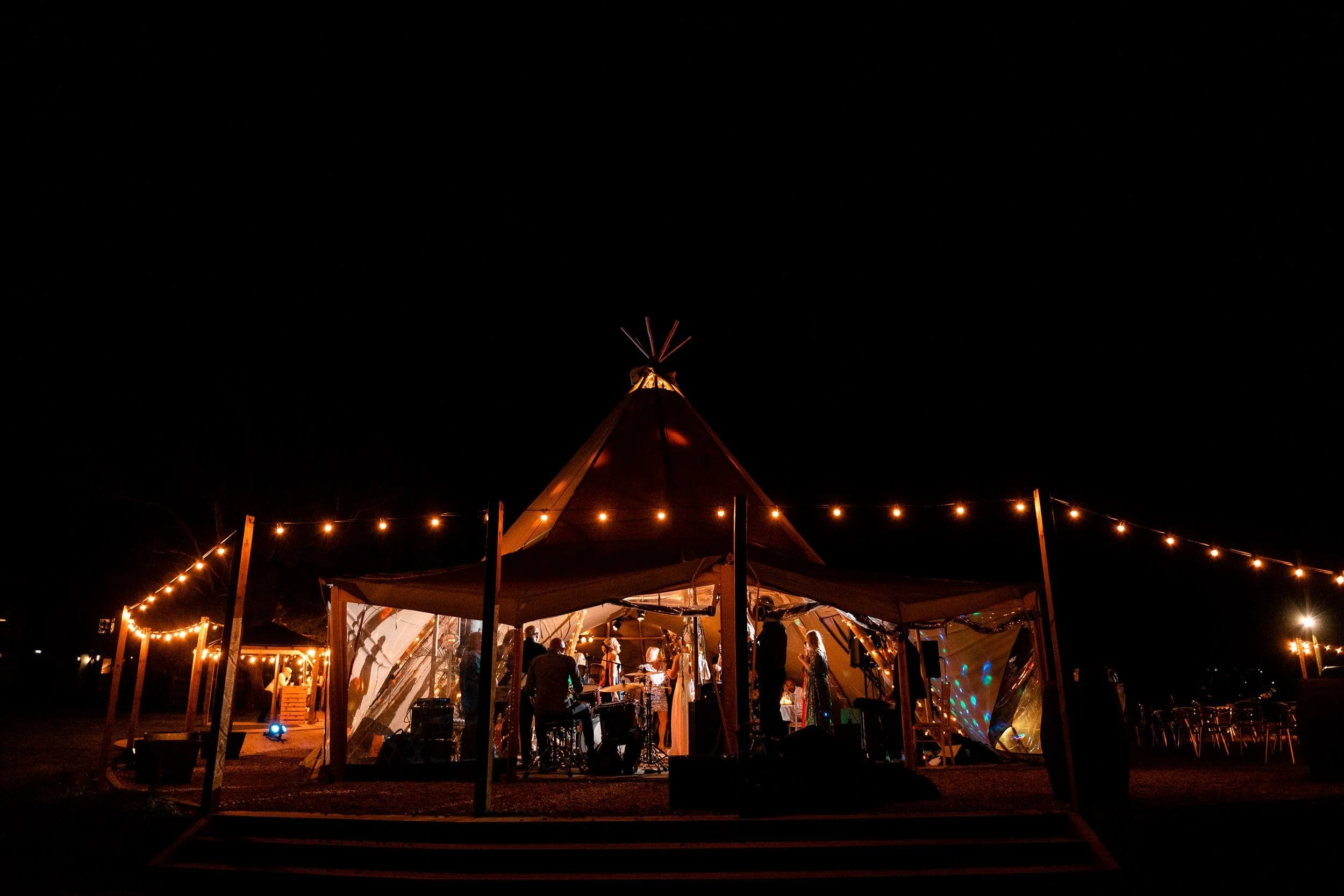 tipi outside dancing.jpeg