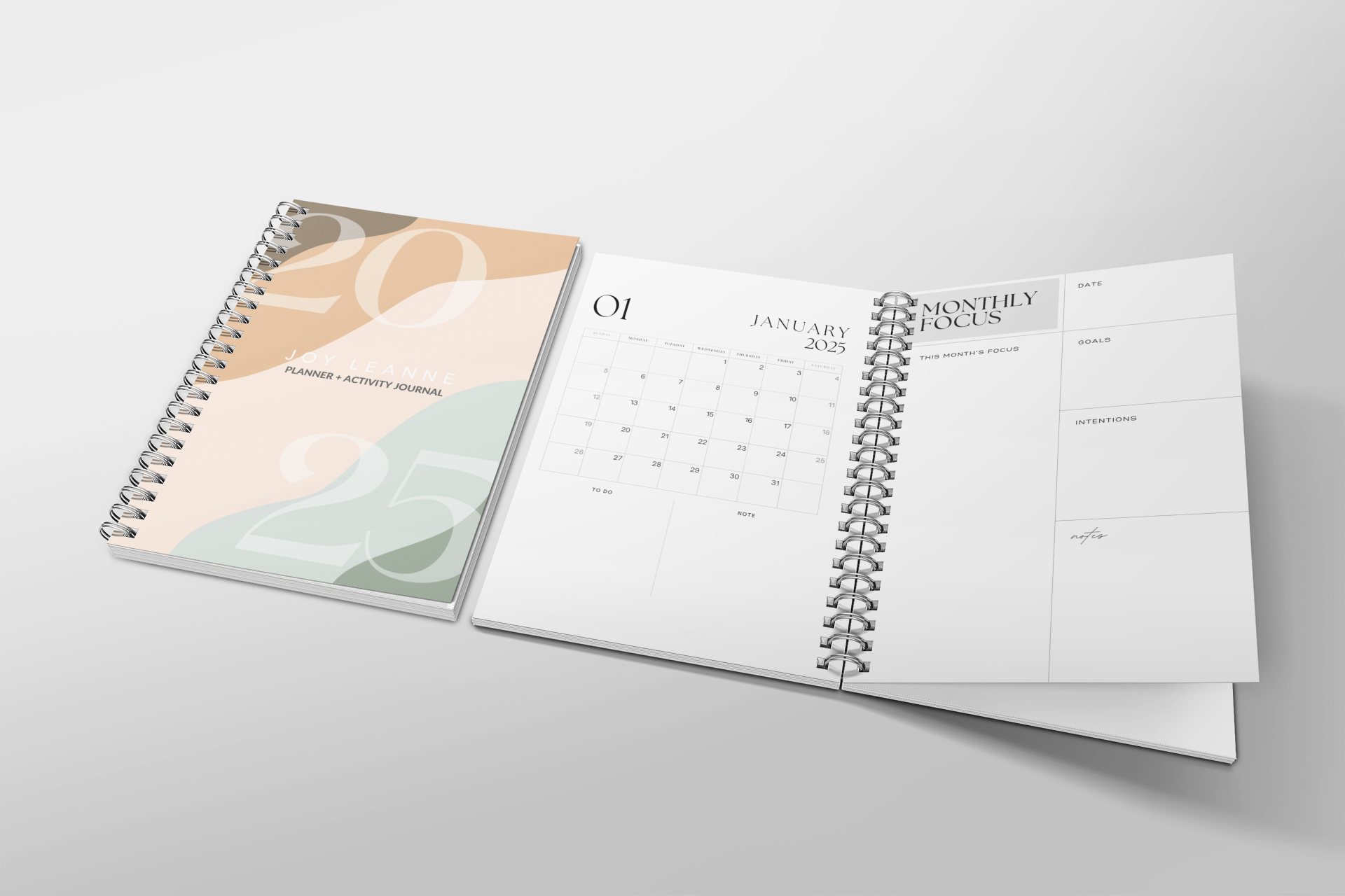 mockup-featuring-an-open-a5-notebook-lying-next-to-a-closed-one-309-el.png