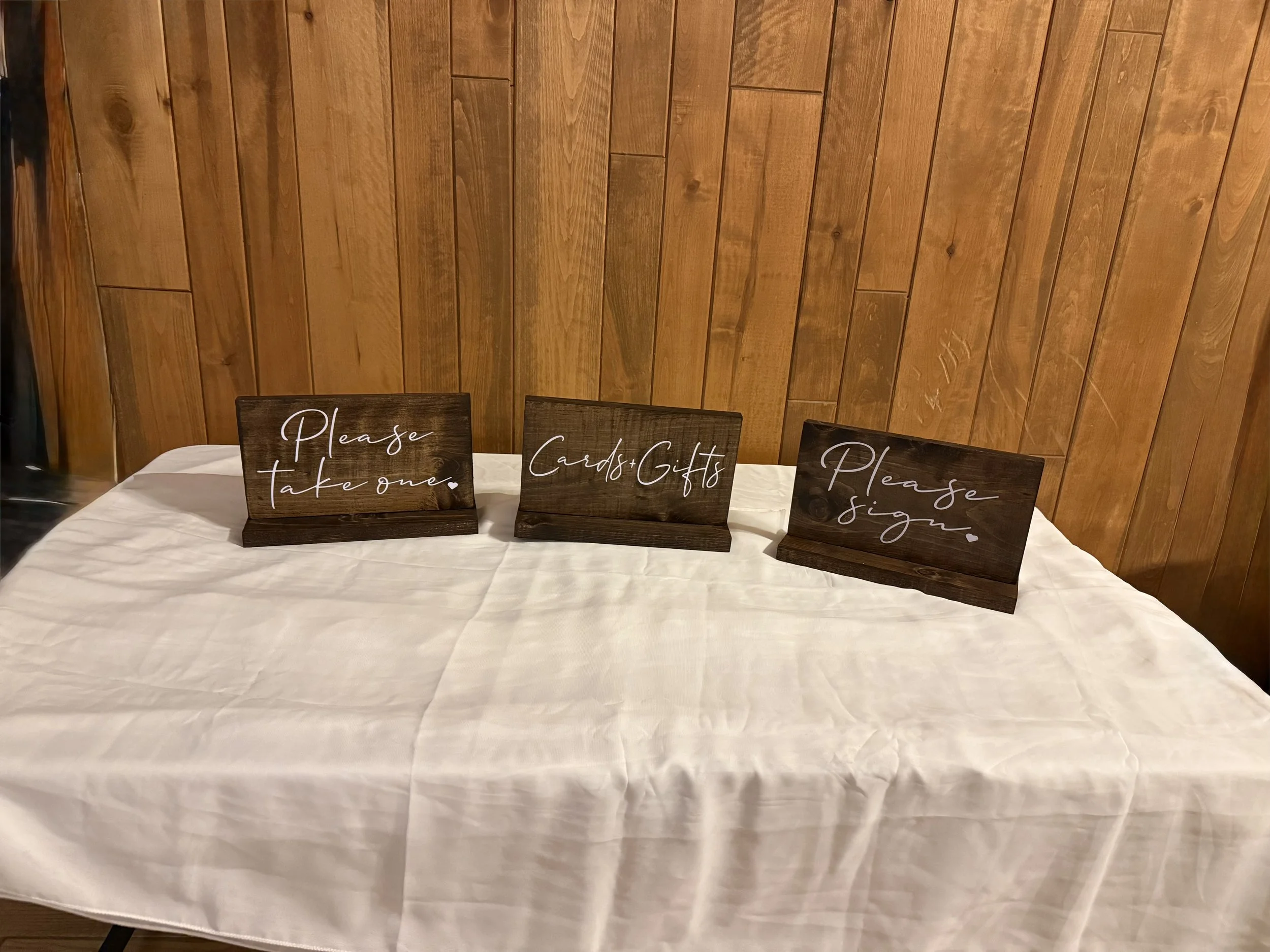 Wooden signs for welcome table