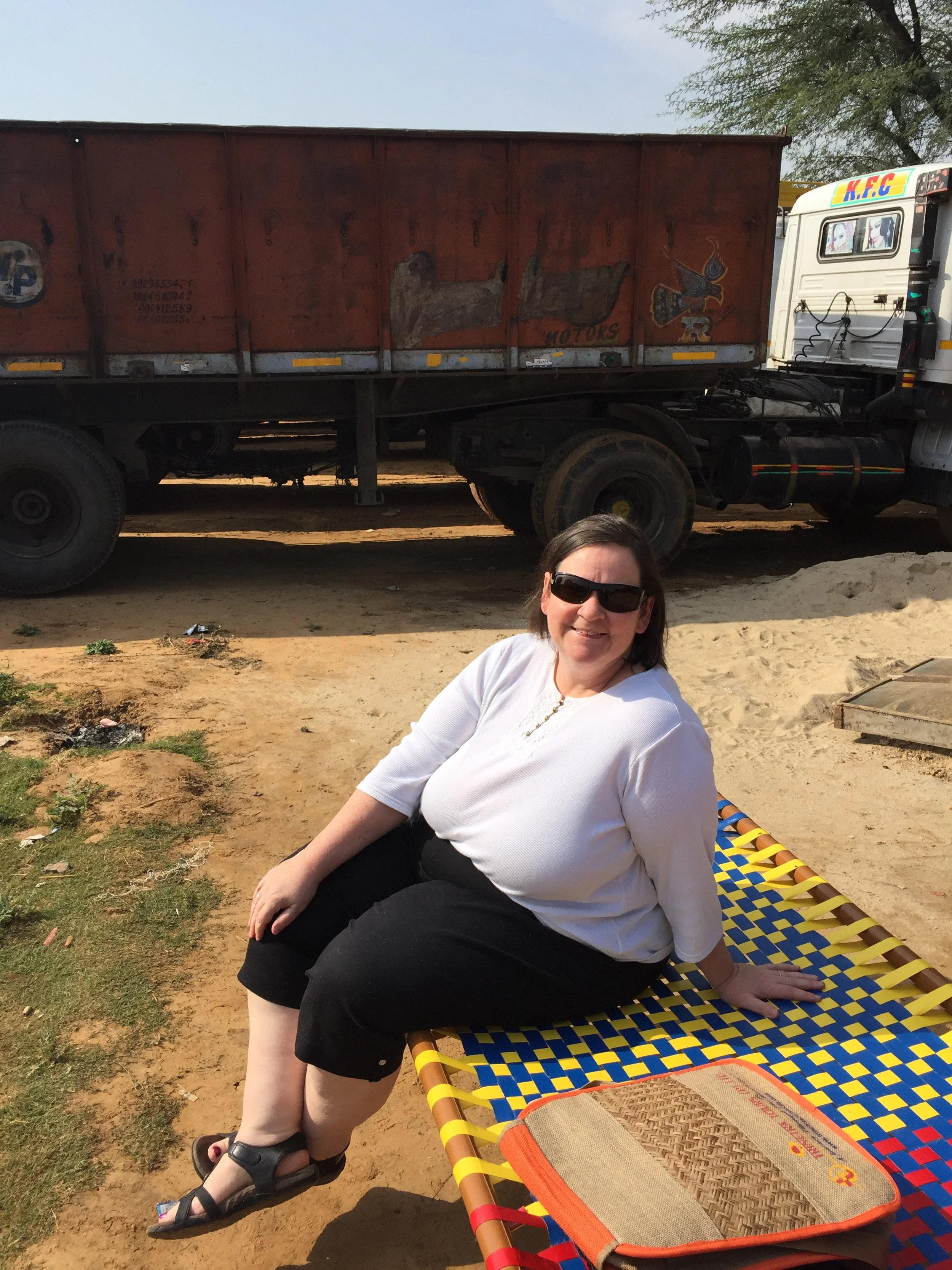 Sandy on sitting cot.
