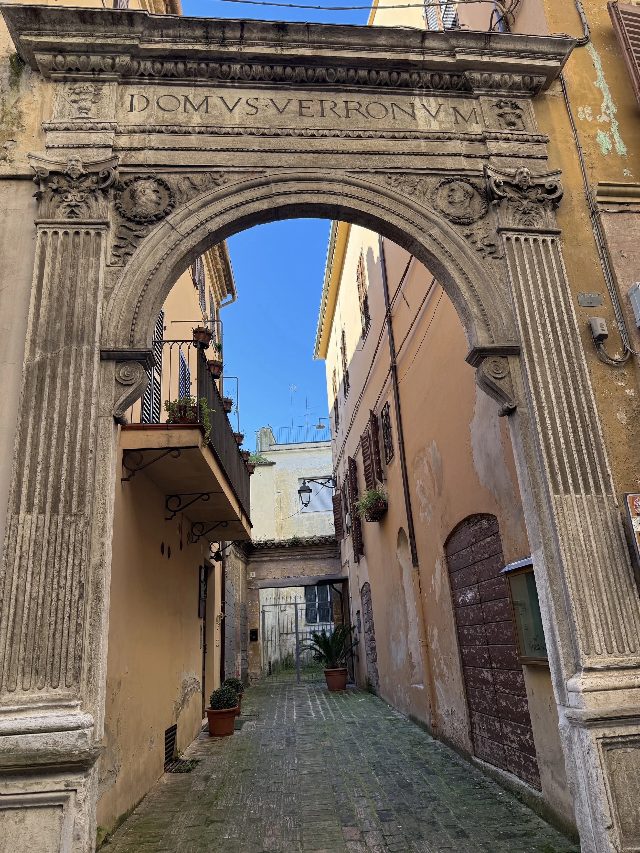 Portal della Domus Verronum. This is the entrance to the house of the Verroni family. In early 1500's wealth families commissioned elaborate facades to mark their status. 