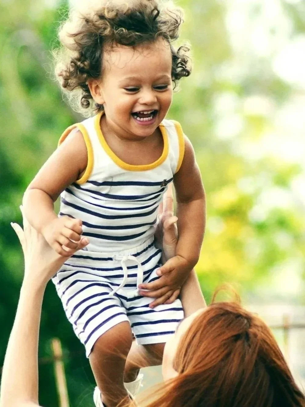 Toddler girl is playing with her mother during speech therapy with New Leaf Speech Services in Cedar Park TX