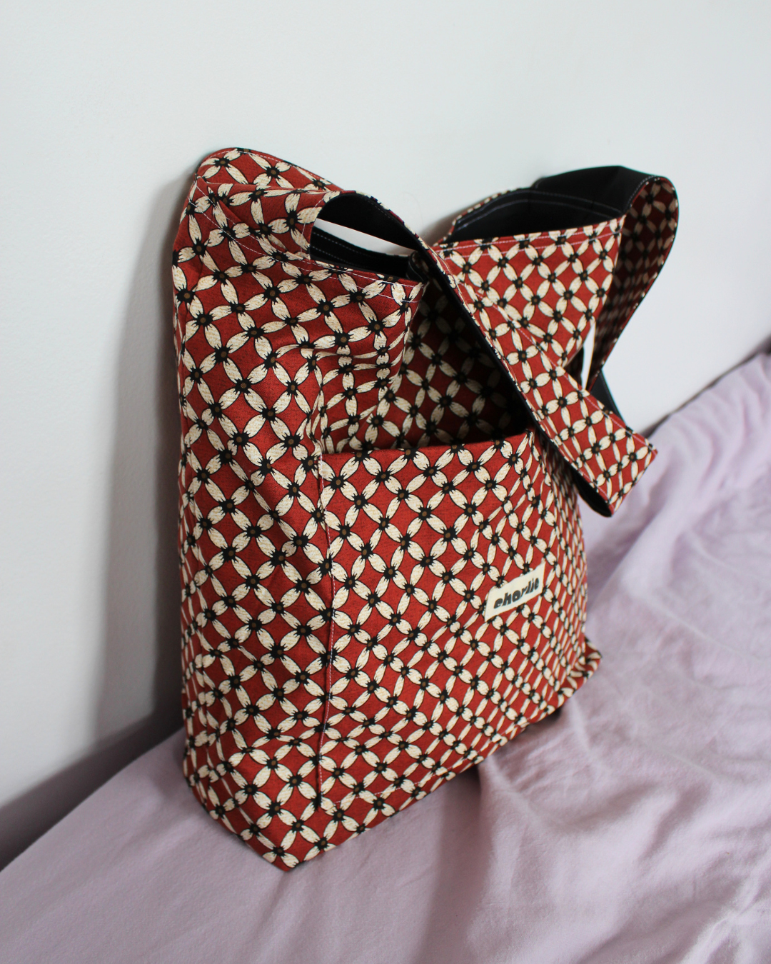 sac-réversible-essentiel-impermeable-noir-rouge-3.png