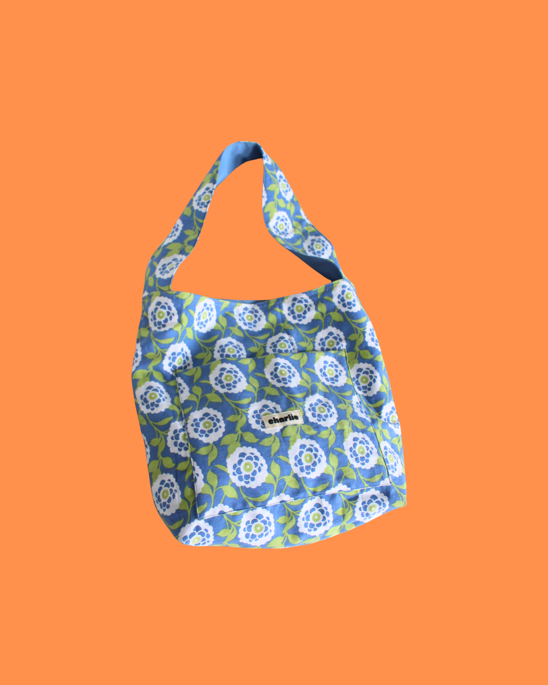essentiel-sac-reversible-impermeable-bleu-ciel-2.png