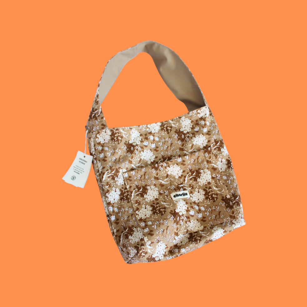 sac-r%C3%A9versible-essentiel-impermeable-beige-fleurs-1.png