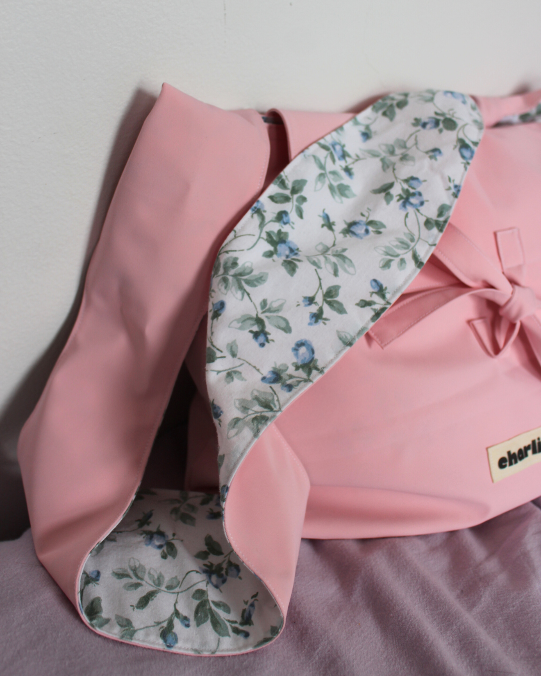 olivia-bandouliere-impermeable-baby-pink-5.png