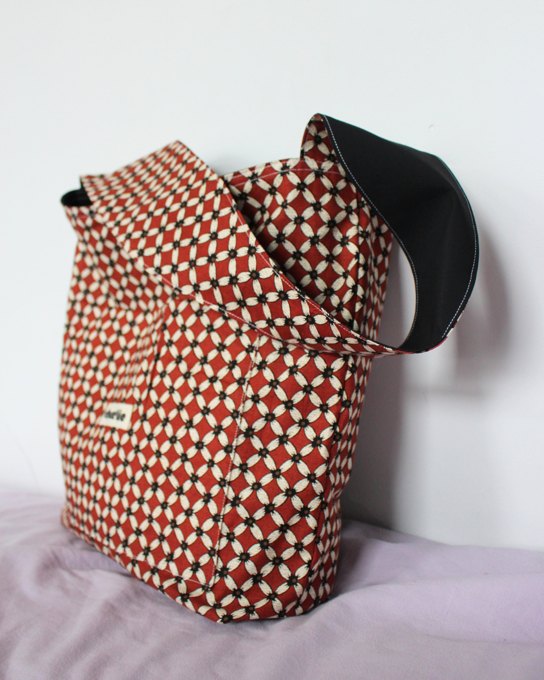 sac-réversible-essentiel-impermeable-noir-rouge-6.png