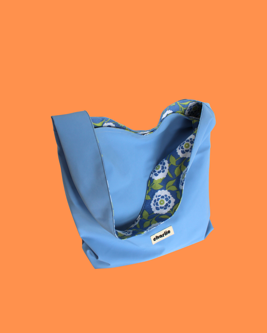 essentiel-sac-reversible-impermeable-bleu-ciel-3.png