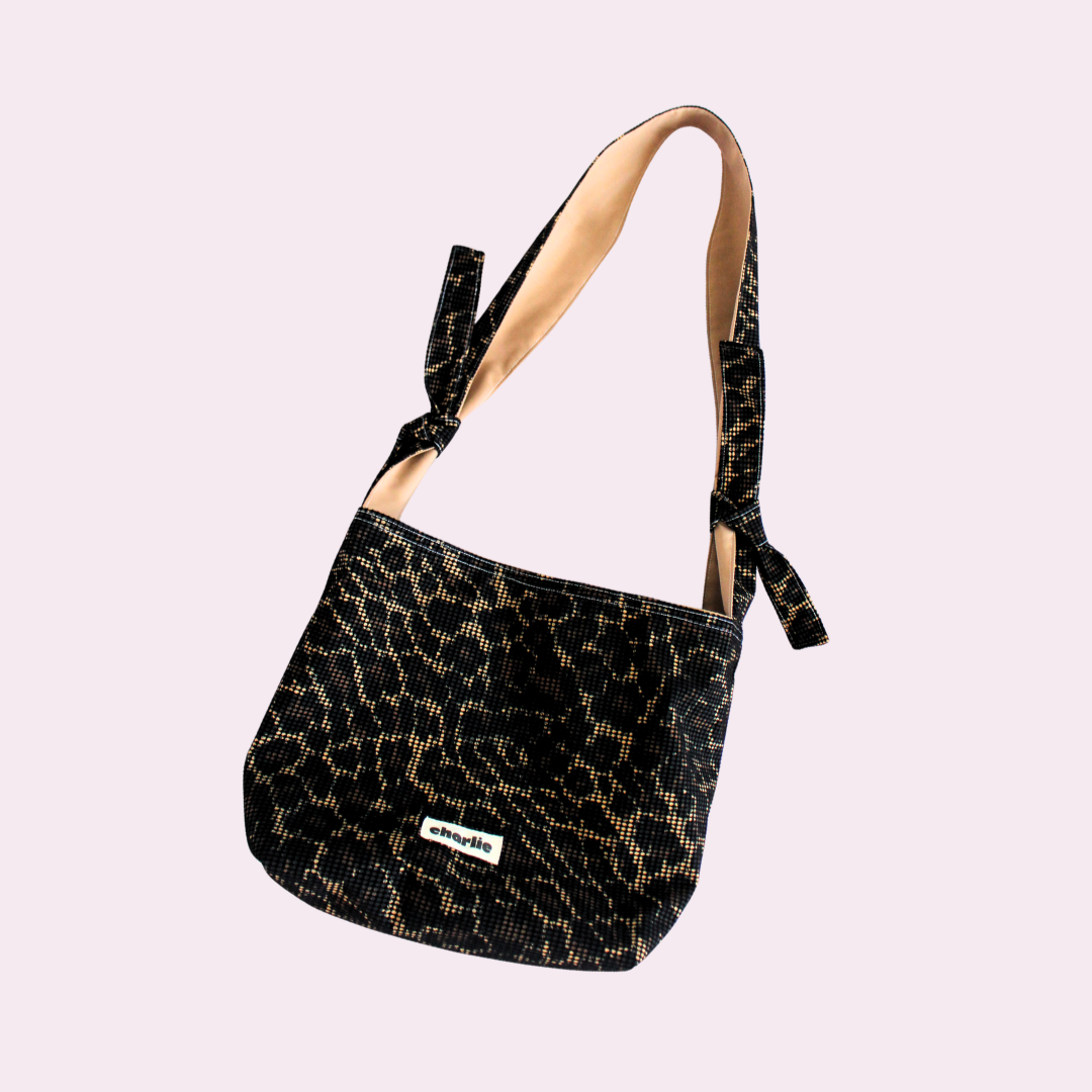 sac-r%C3%A9versible-eva-bandouliere-impermeable-l%C3%A9opard-7.png