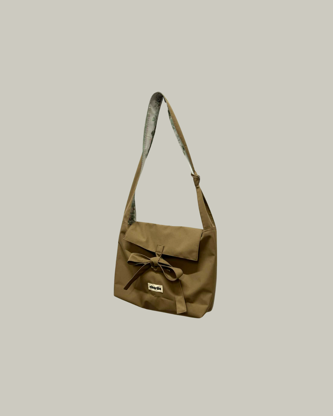 olivia-bandouliere-impermeable-brun-1.png