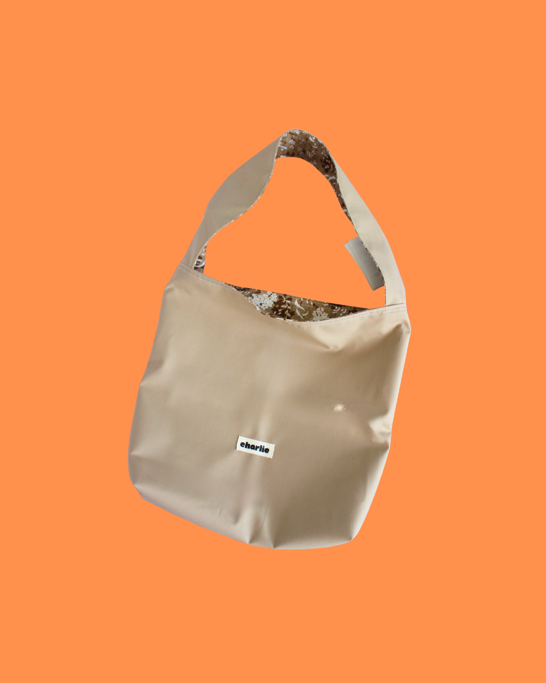 sac-réversible-essentiel-impermeable-beige-fleurs-2.png
