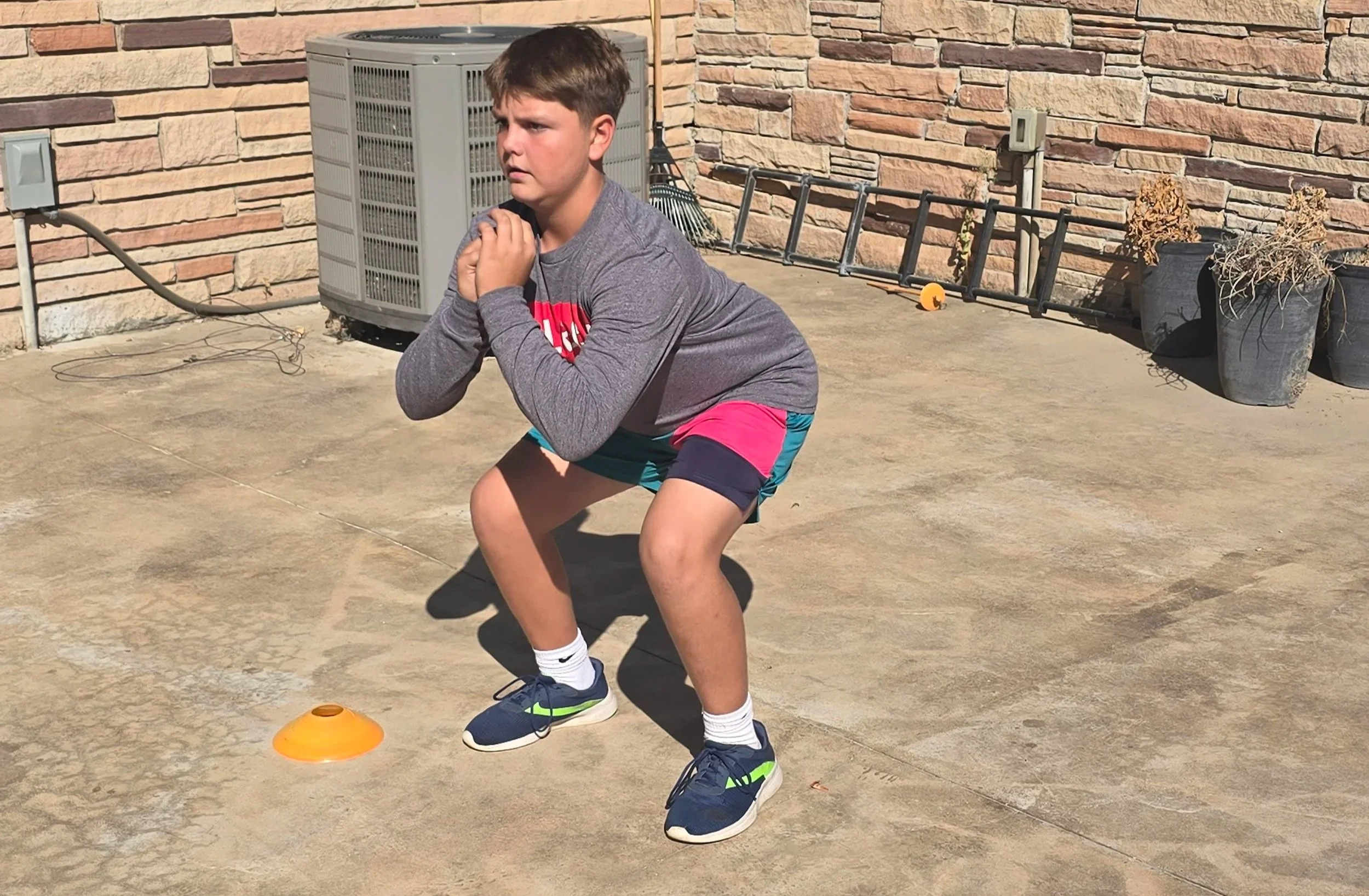 Student Practicing Squats