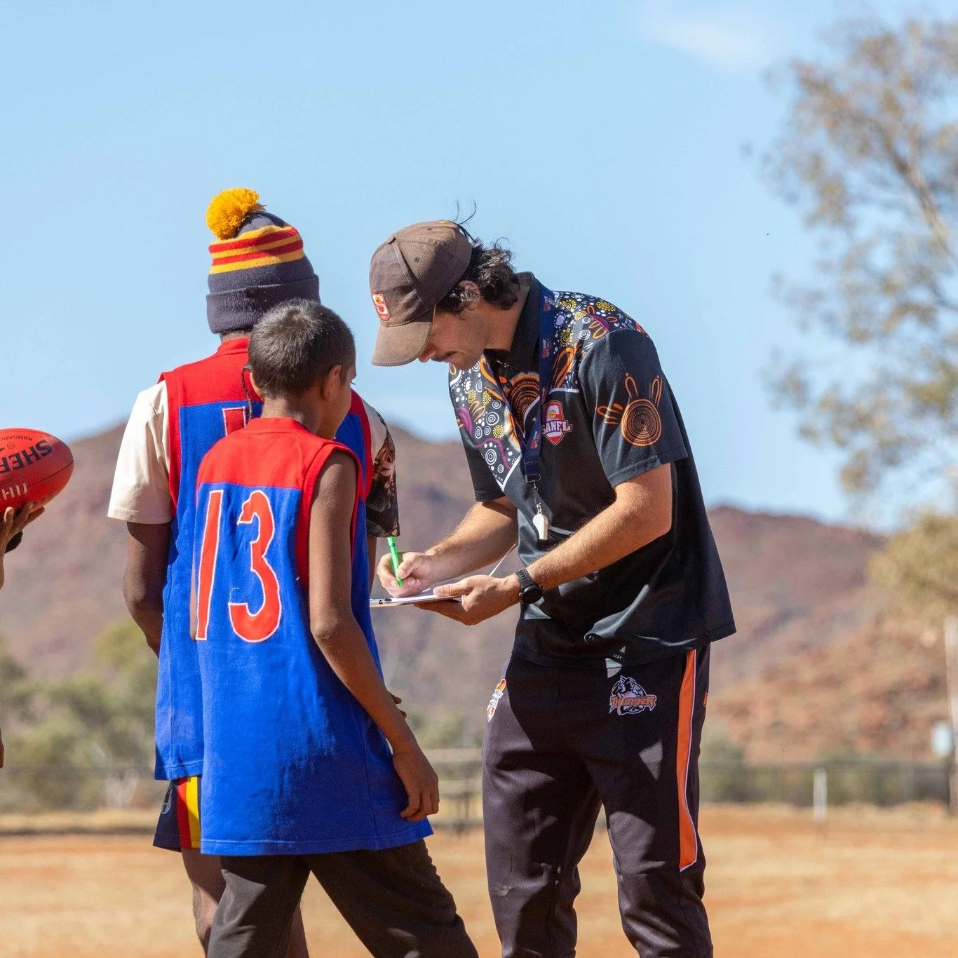 Recently, PYEC staff supported the SANFL with the APY Thunder trial match in Ernabella ensuring young fellas from Mimili, Fregon and Amata could make the try outs. Thanks Tjindu foundation for the photos!
