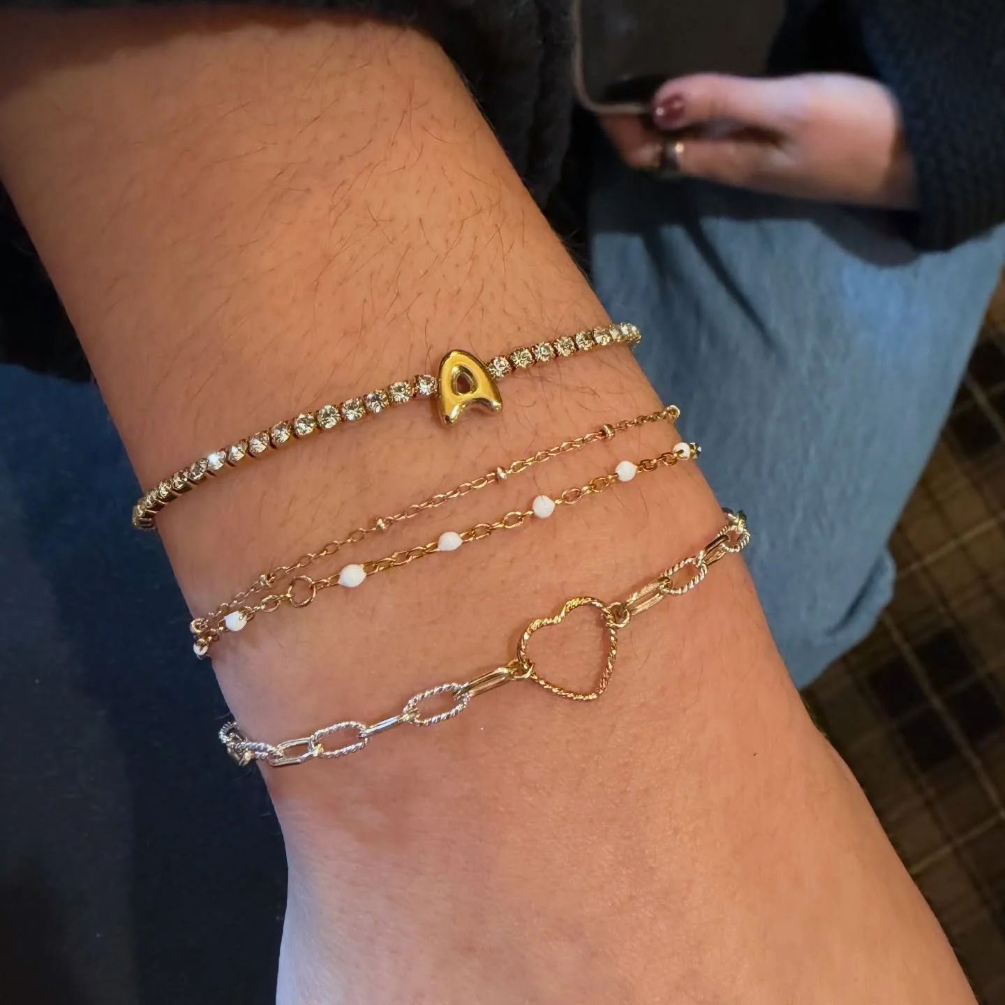 Our two-toned chain with the textured heart connector is the perfect addition to this stack 😍
