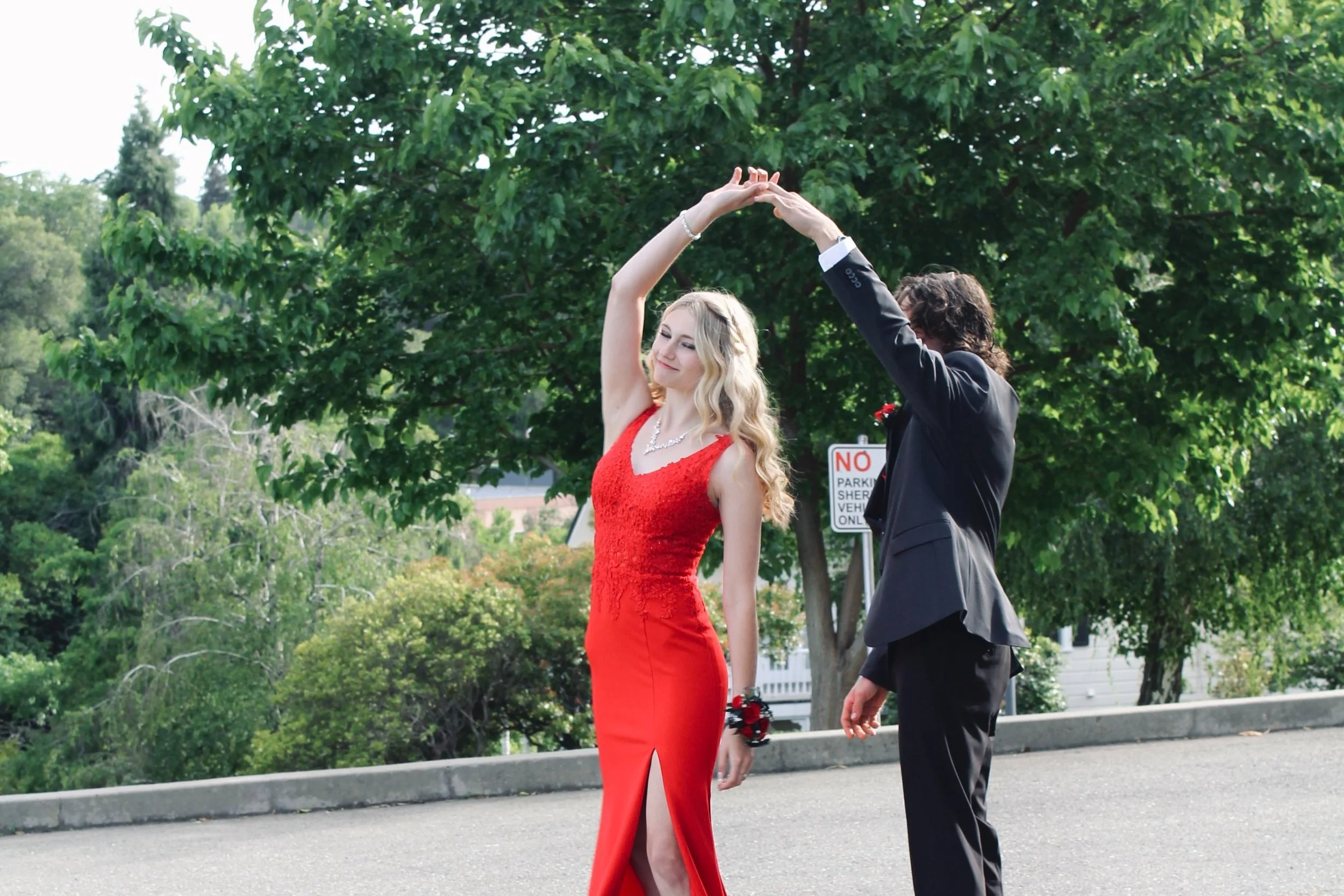Laurie’s customers, Evan and Kade, running down a mountain after getting married. 