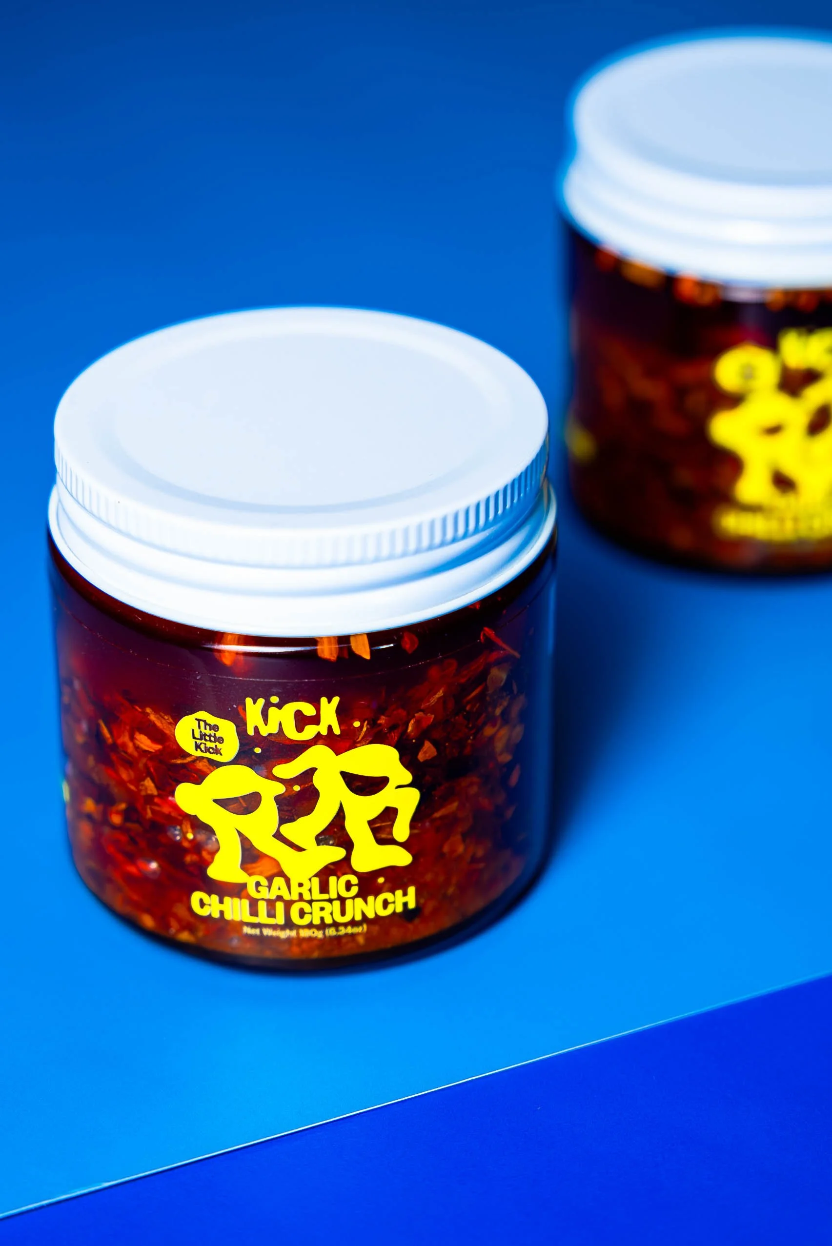 Elevate your meals with KICK Garlic Chilli Crunch – a perfect balance of heat, garlic, and savory crunch.