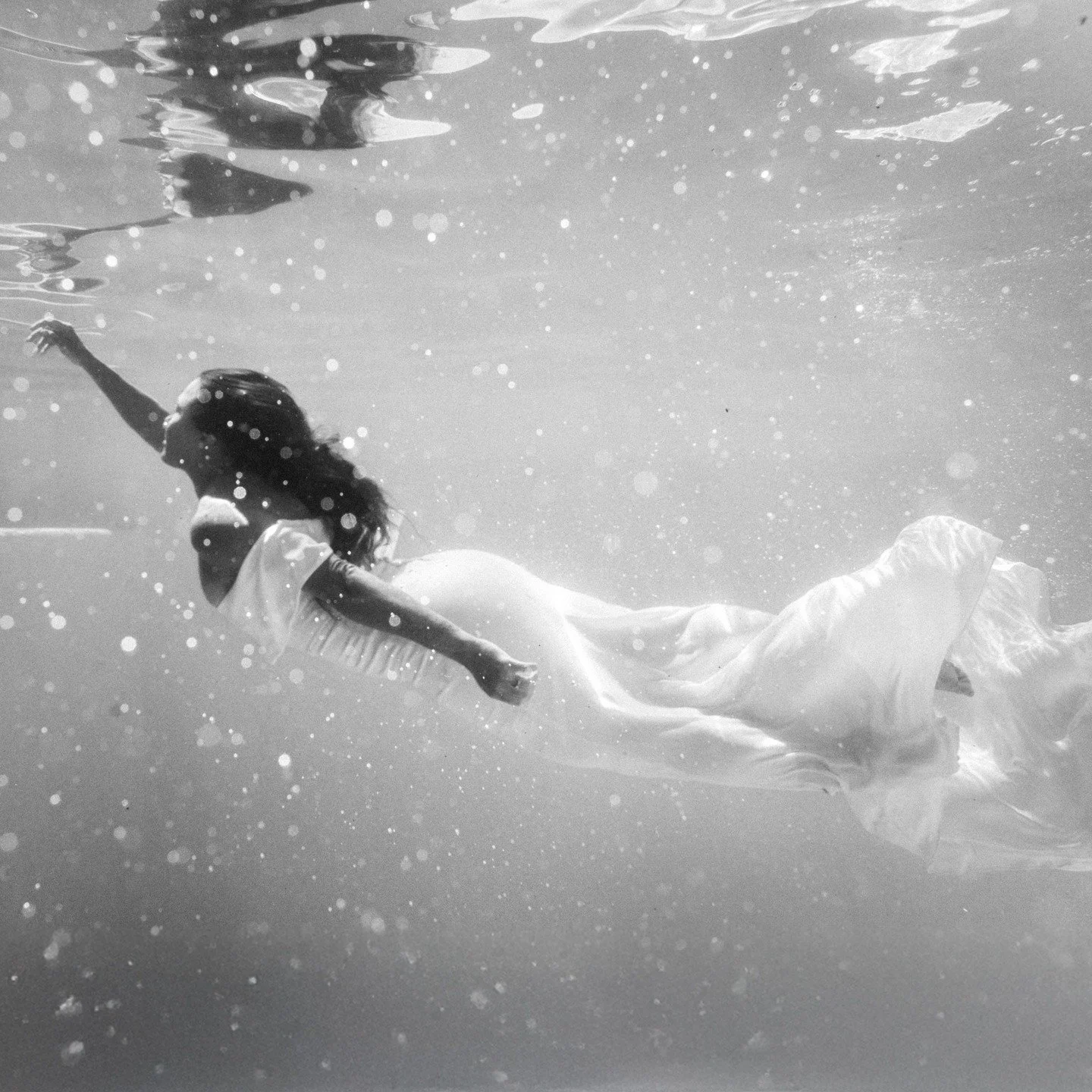 FROM BEACH TO POOL STUDIO 🌊

Something NEW is coming for photographers who want to step into it.

The ocean taught me to read light.
The studio lets me control it.

This image was created in still water &mdash; no tide, no swell, just breath, fabric