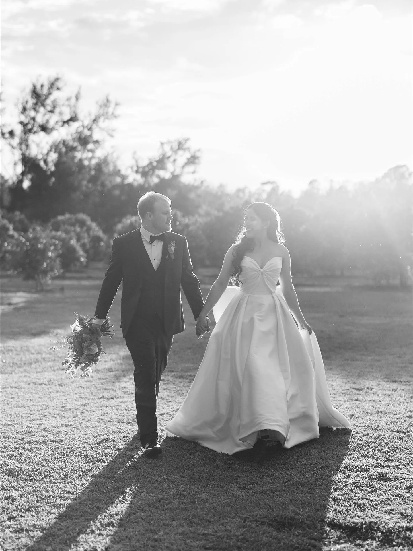 Hand in hand into forever. 🤍

Venue - @everafterfarms Florist - @SweetJulietDesigns
Hair &amp; Makeup - @malalaglam
Desserts - @jojossweetshop84
Dress - @MinervasBridal
Photography &amp; Videography - @createdbypatty