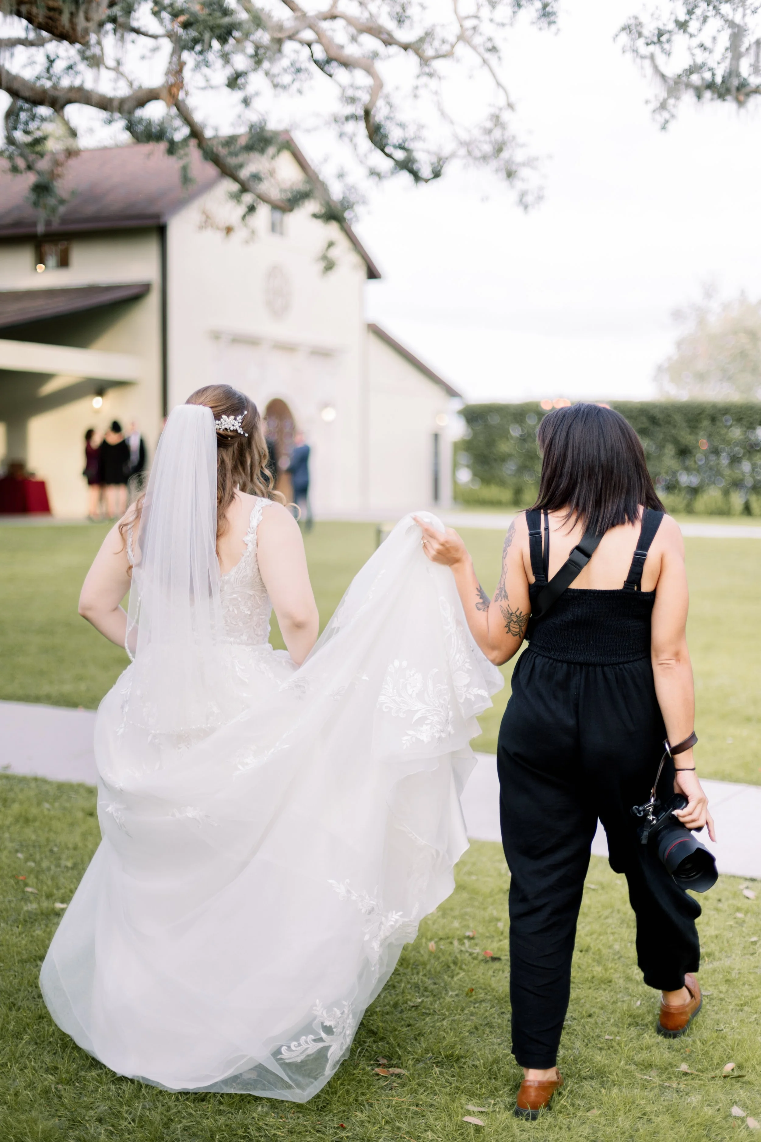Wedding photographer Patty of Created by Patty photographing a bride outdoors on her wedding day