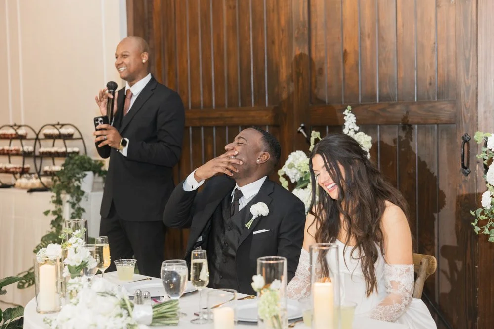 Bride and groom laugh during a reception toast at a Central Florida wedding, photographed by Created by Patty