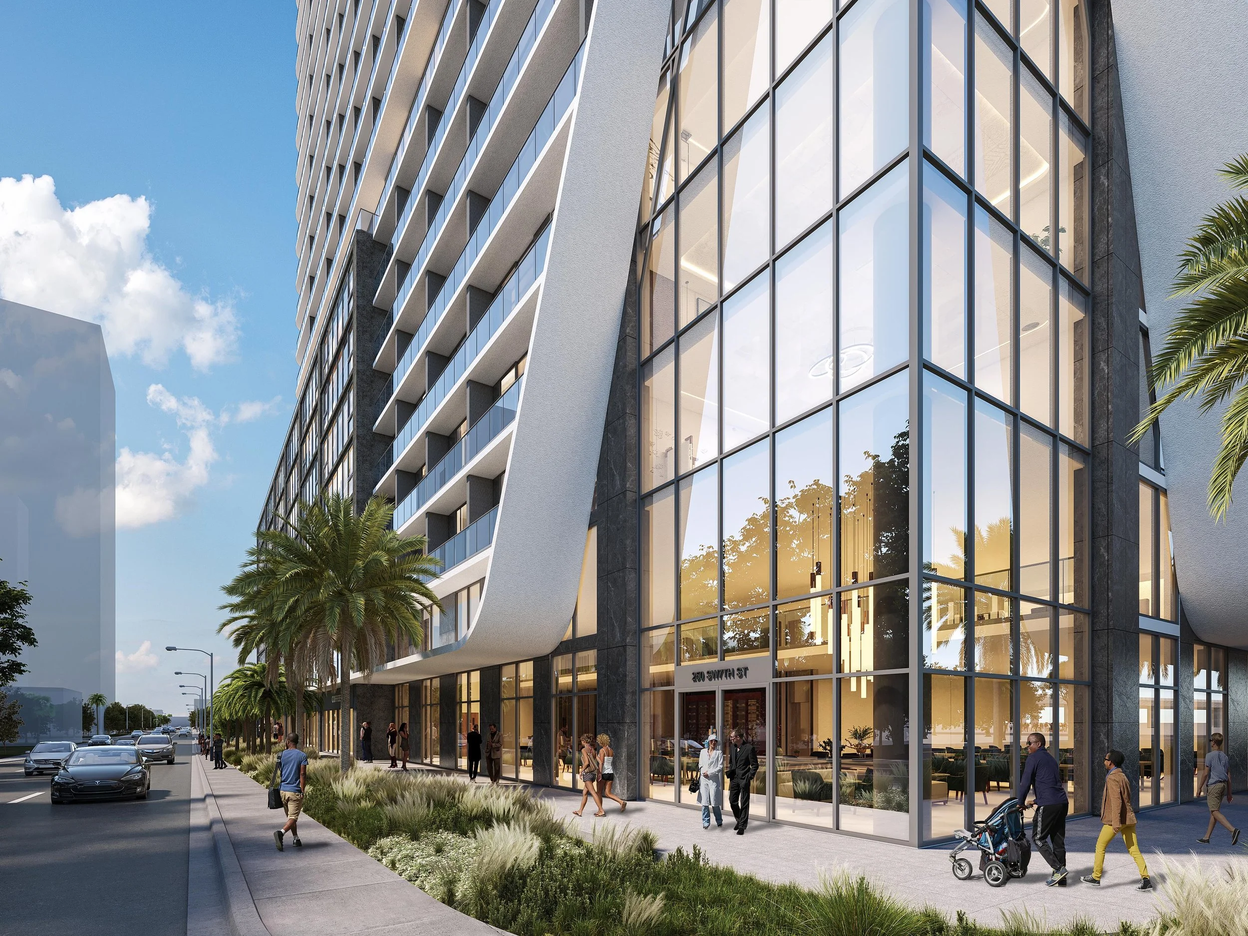 A modern multi-story building with large glass windows and people walking outside on a city sidewalk, with palm trees and a car-lined street.