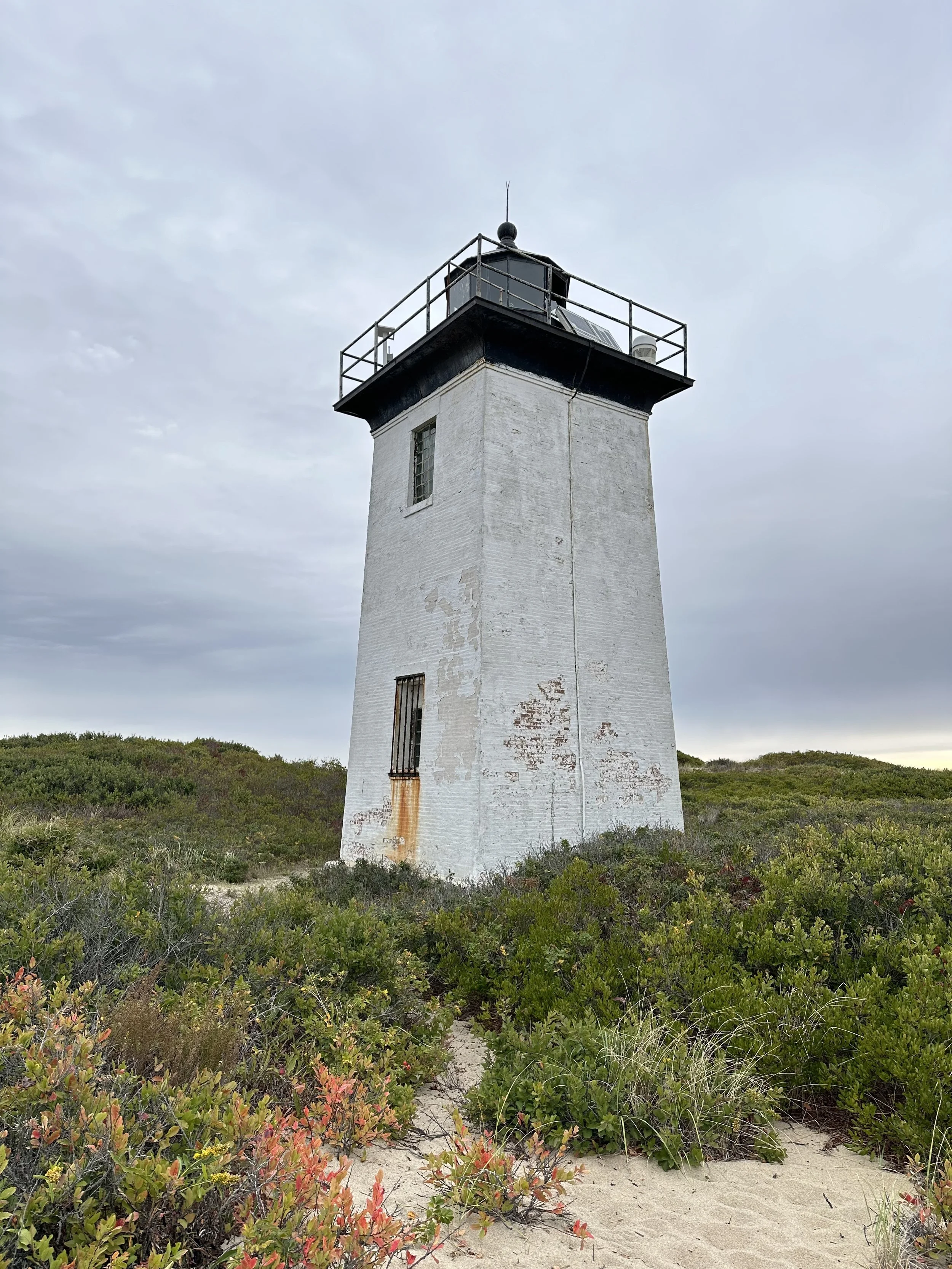 Lighthouse symbolizing resilience and guidance through change