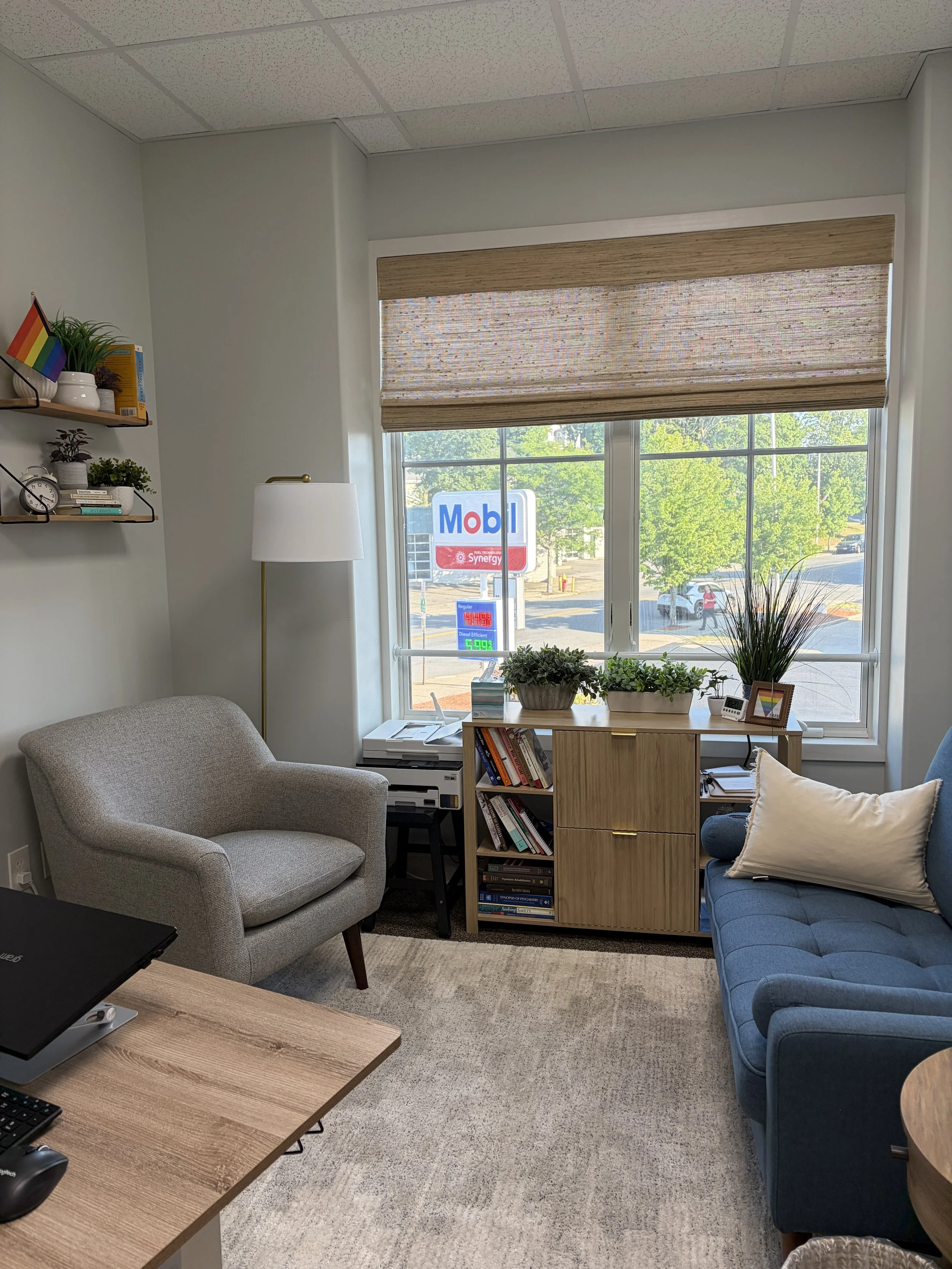 A calm, sunlit therapy office in Melrose, MA where Michelle Collins, LICSW, meets with adults and young professionals for anxiety and life transitions counseling.