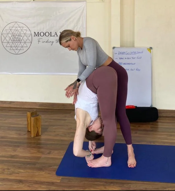 The Ultimate Guide to Hands-On Adjustments in Yoga: Benefits, Safety, and Training Techniques
