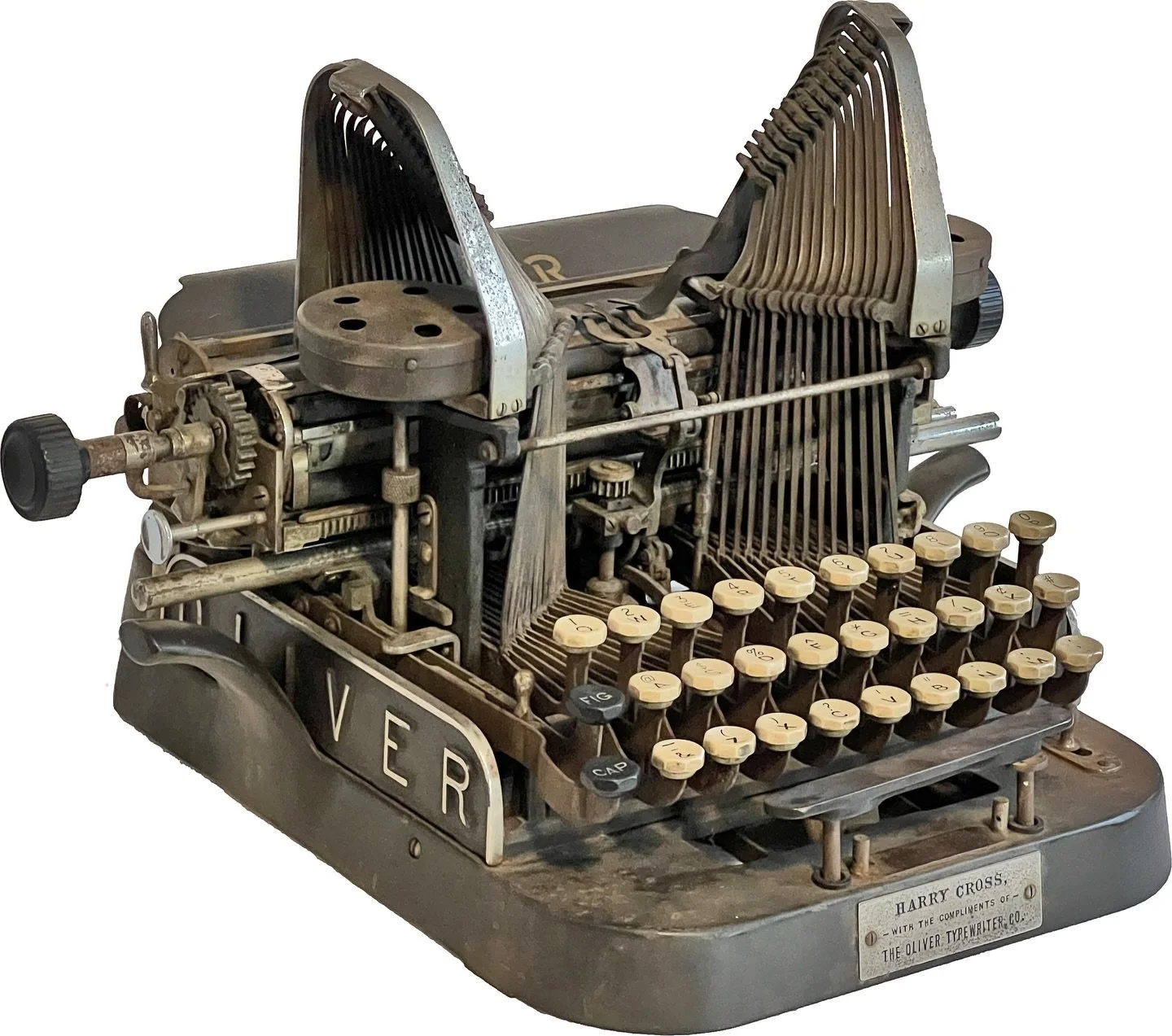 Oliver No. 2 #8380 was given to Harry Cross, the head inspector of the Oliver Typewriter Company, as indicated by its custom front plaque.