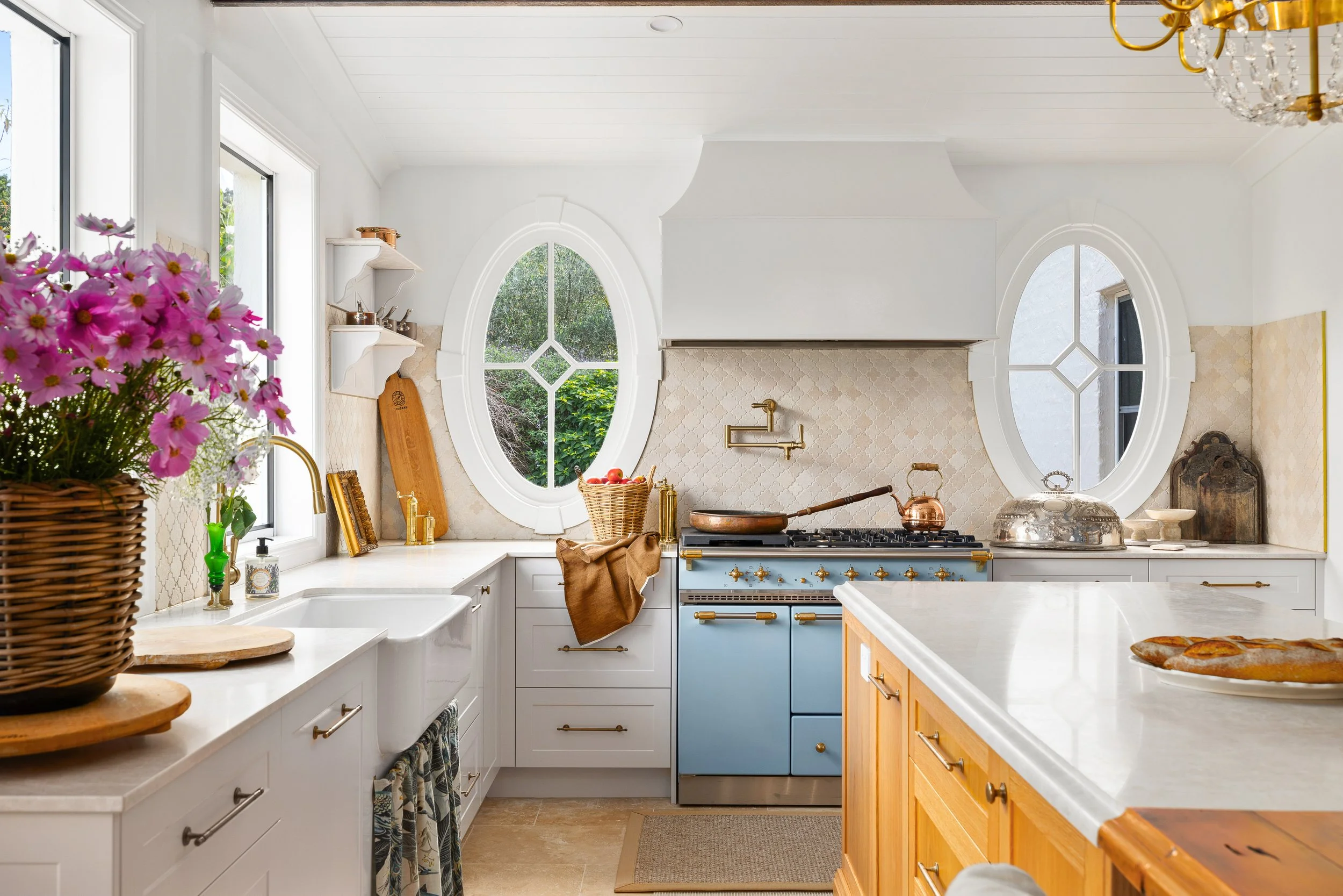 New luxury kitchen with european features and a large gas burning stove oven combination. 