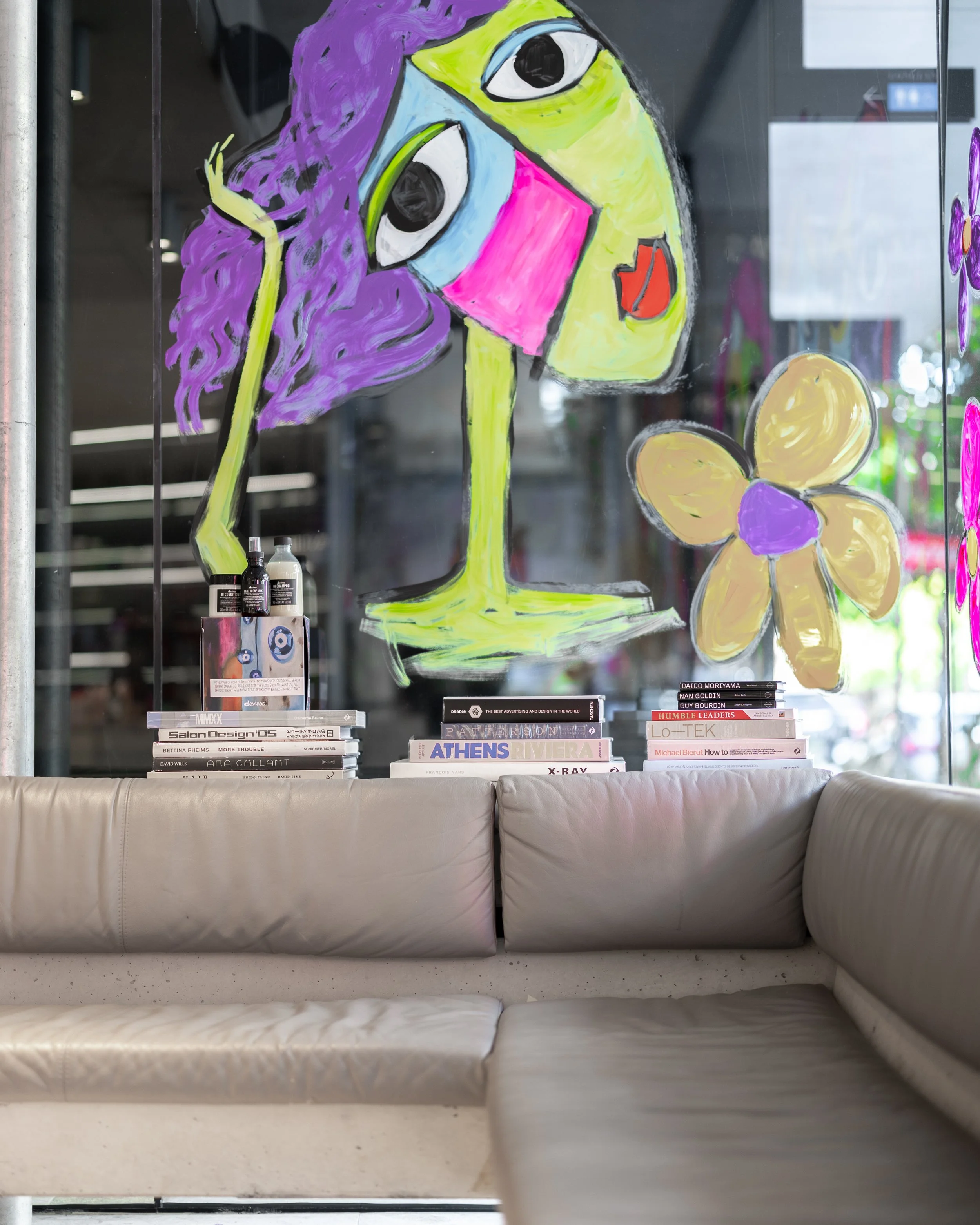 Luxury salon in Brisbane City, with hand done local window art.